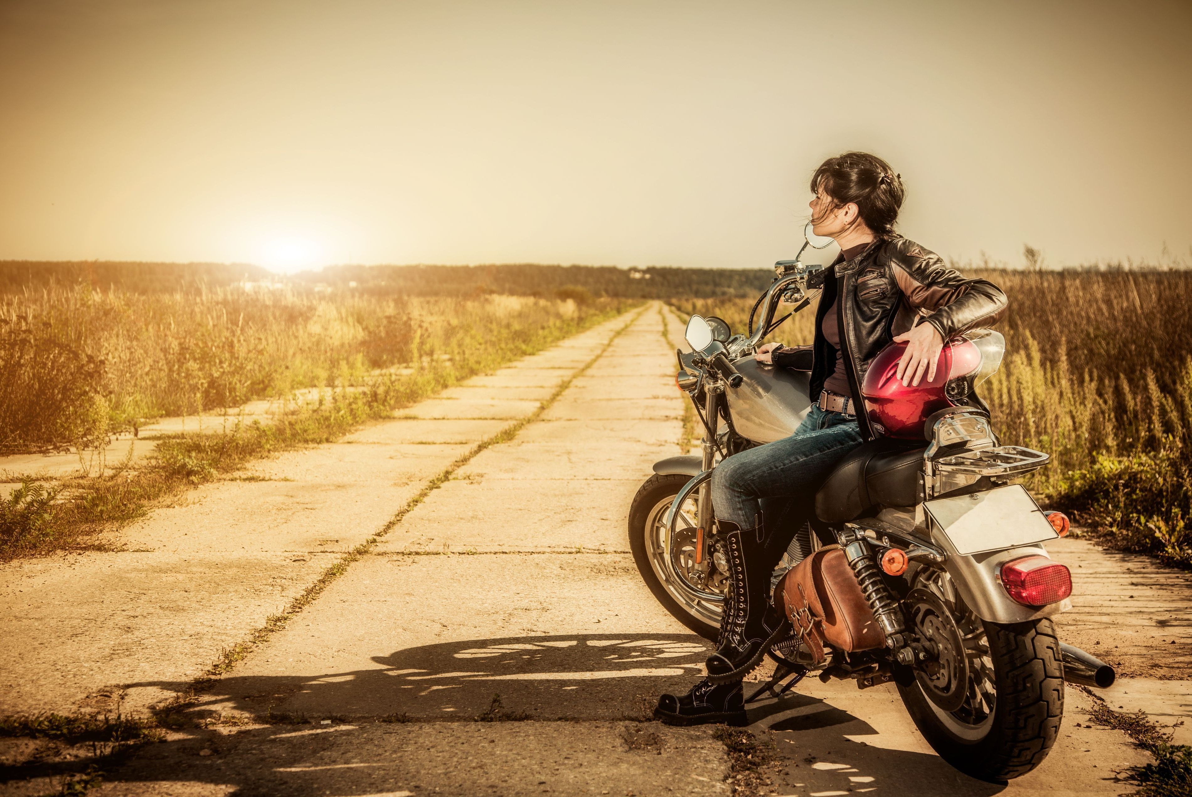 HD photo of girl biker, wallpaper of a trip on a motorcycle, road