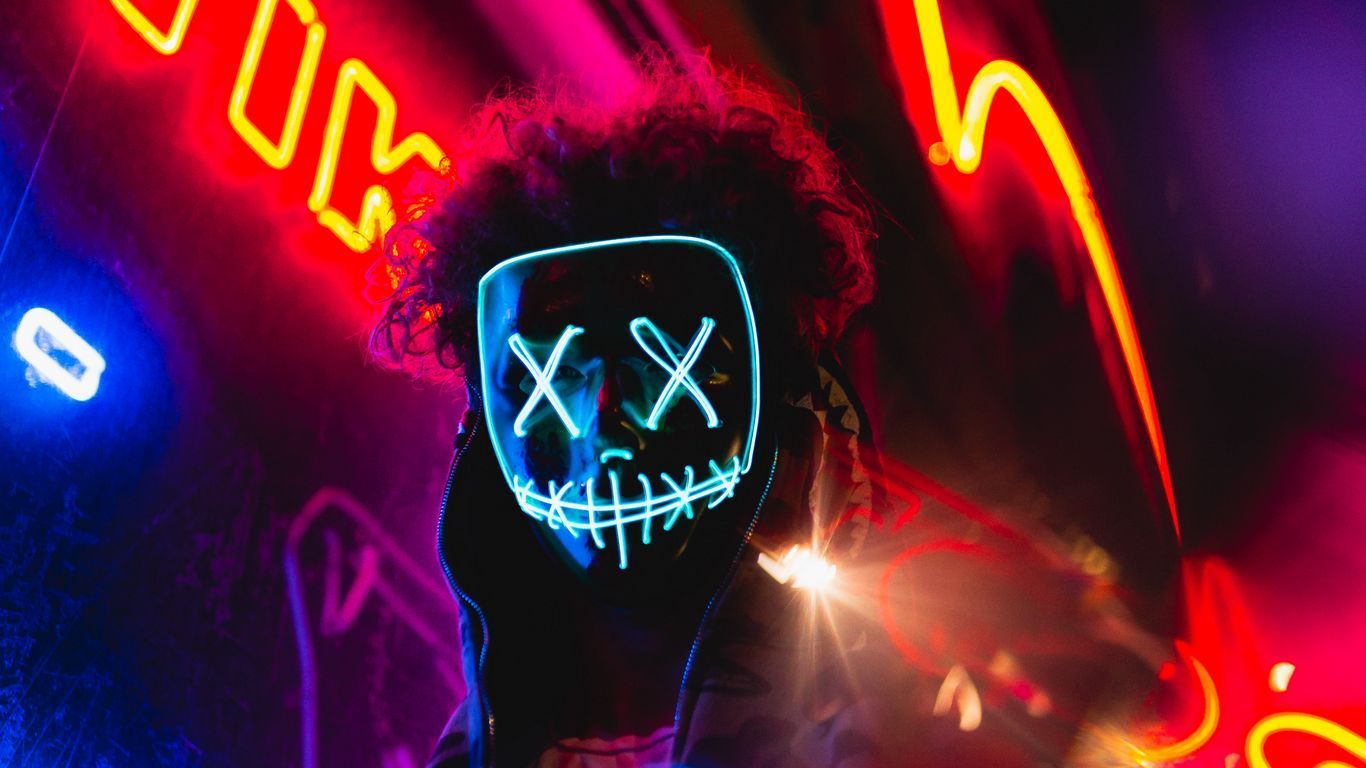 Download wallpaper 1366x768 mask, neon, anonymous, light, man