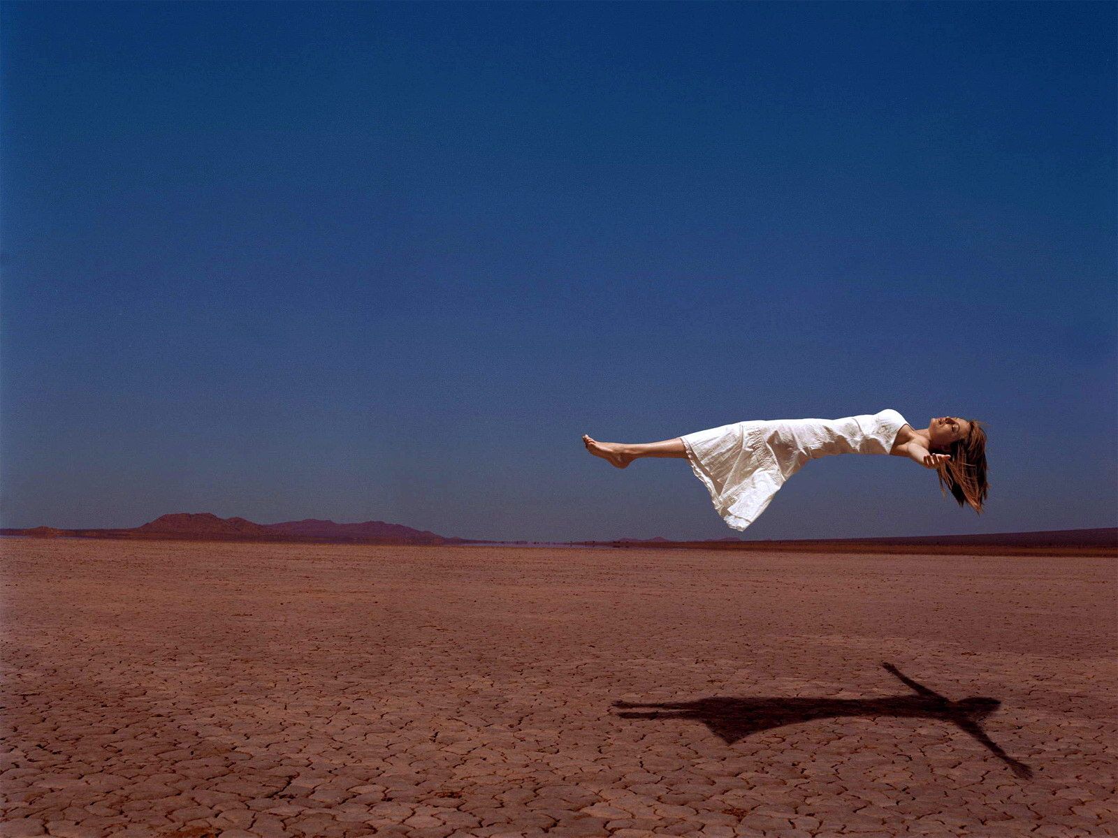Wallpaper levitation, woman, desert, dress desktop wallpaper