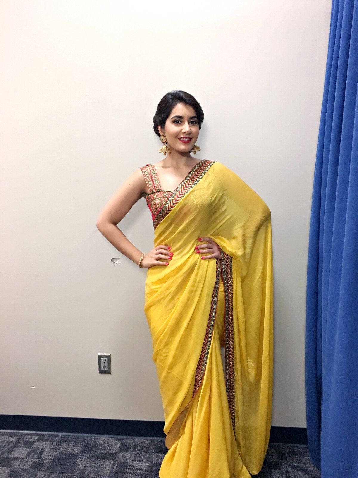 Rashi khanna looking beautiful in yellow saree photo 12. telugu