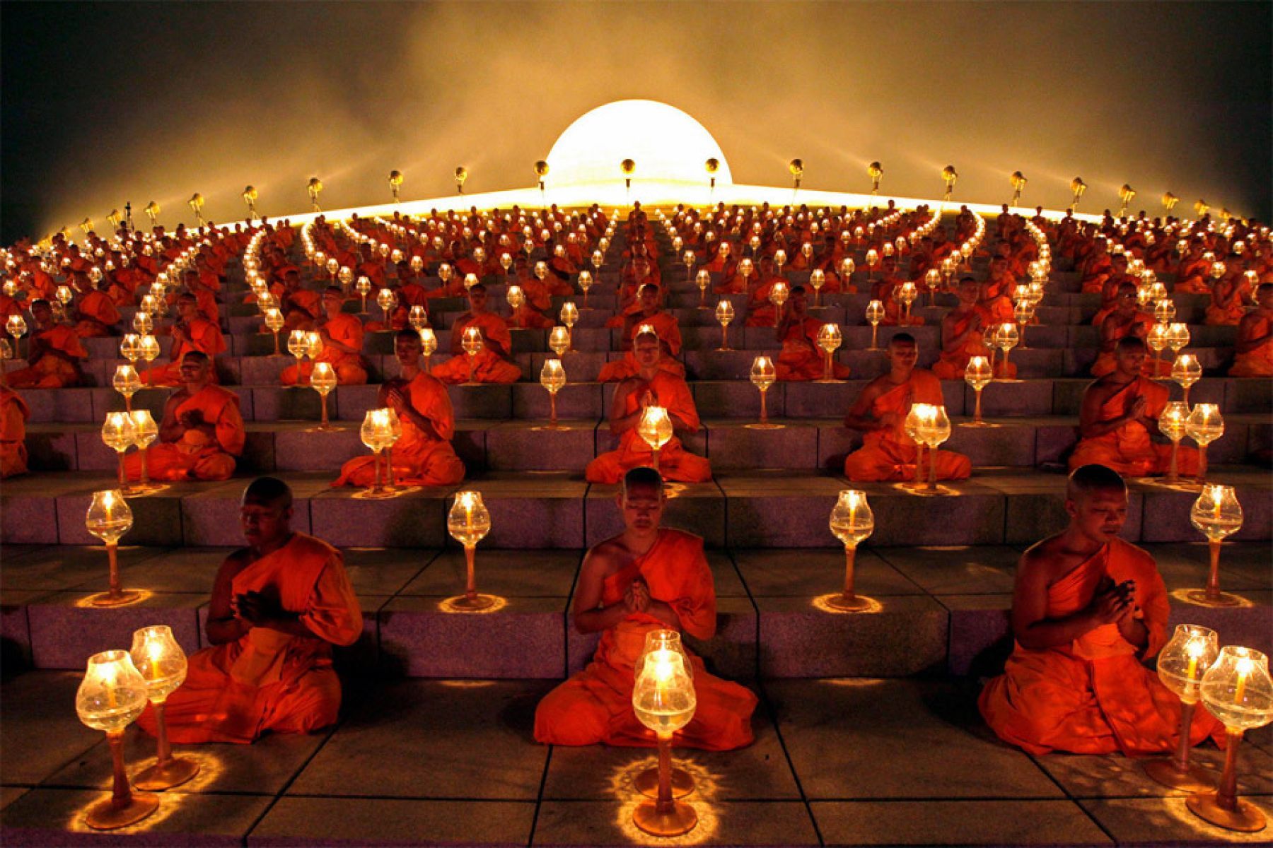 Buddhist Monks At A Lantern Lighting Ceremony Wallpaper