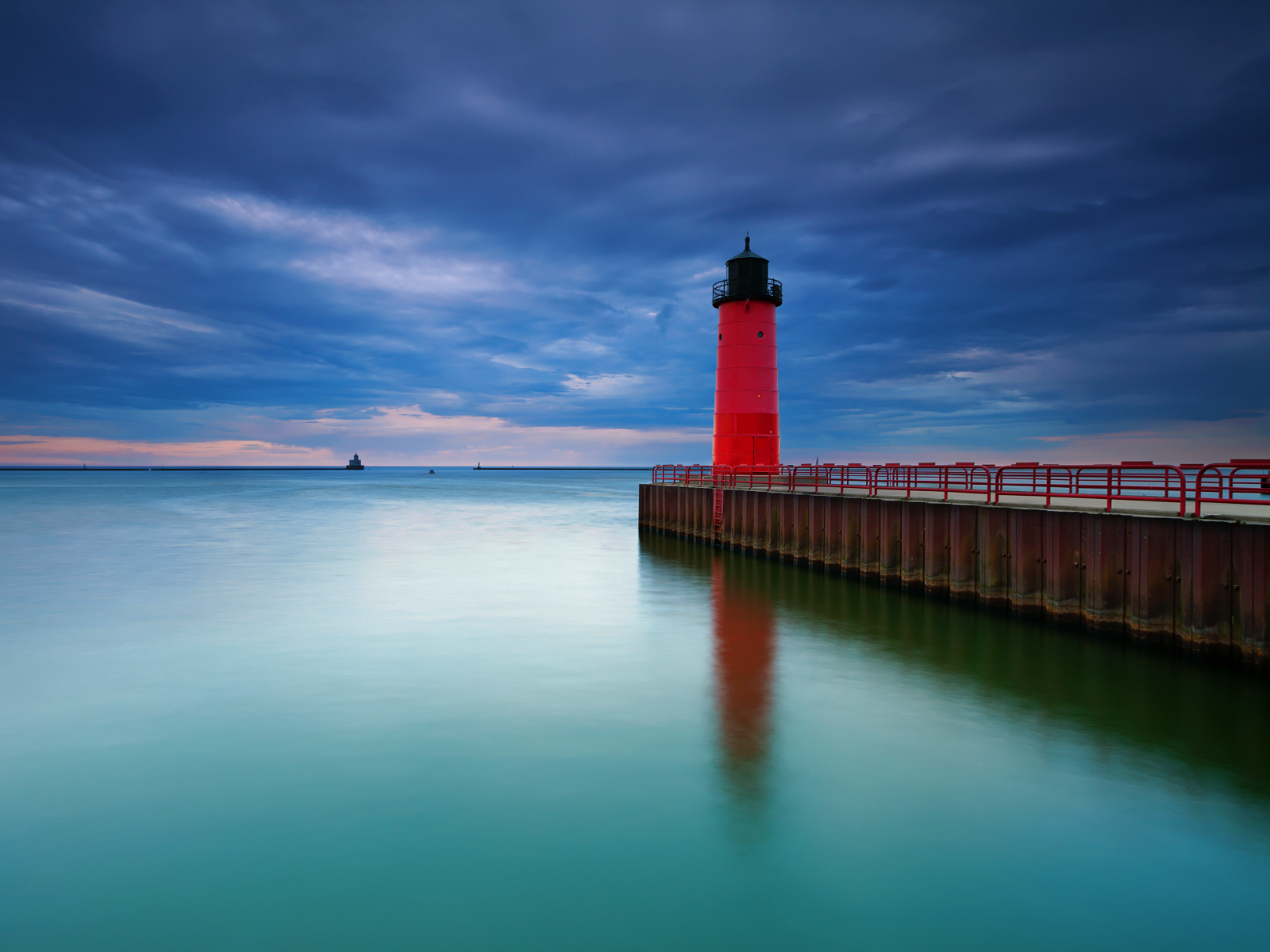 Red Lighthouse Storm Clouds wallpaper
