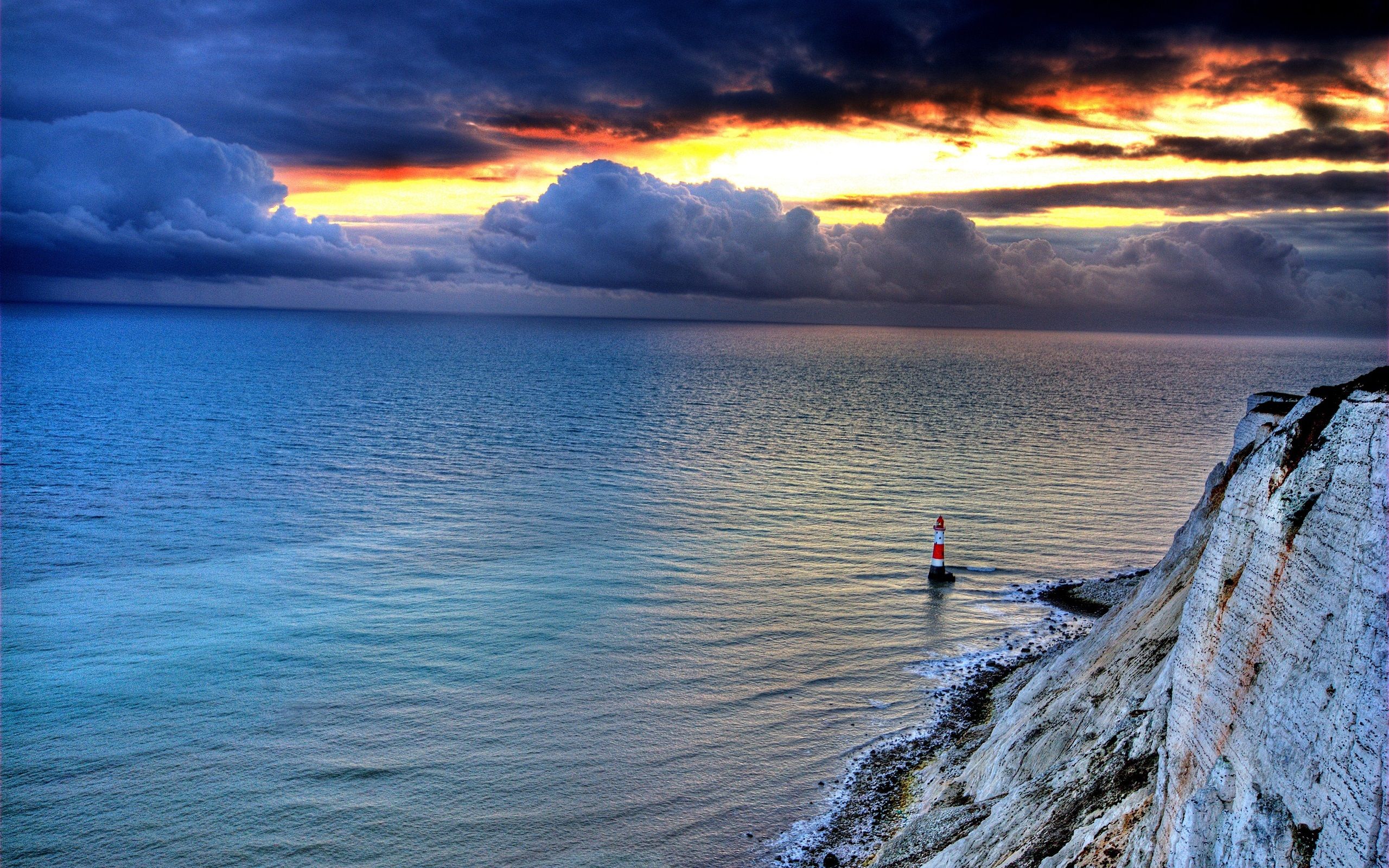 Wallpaper Sea, rock, lighthouse, sky, clouds, sunset, dusk