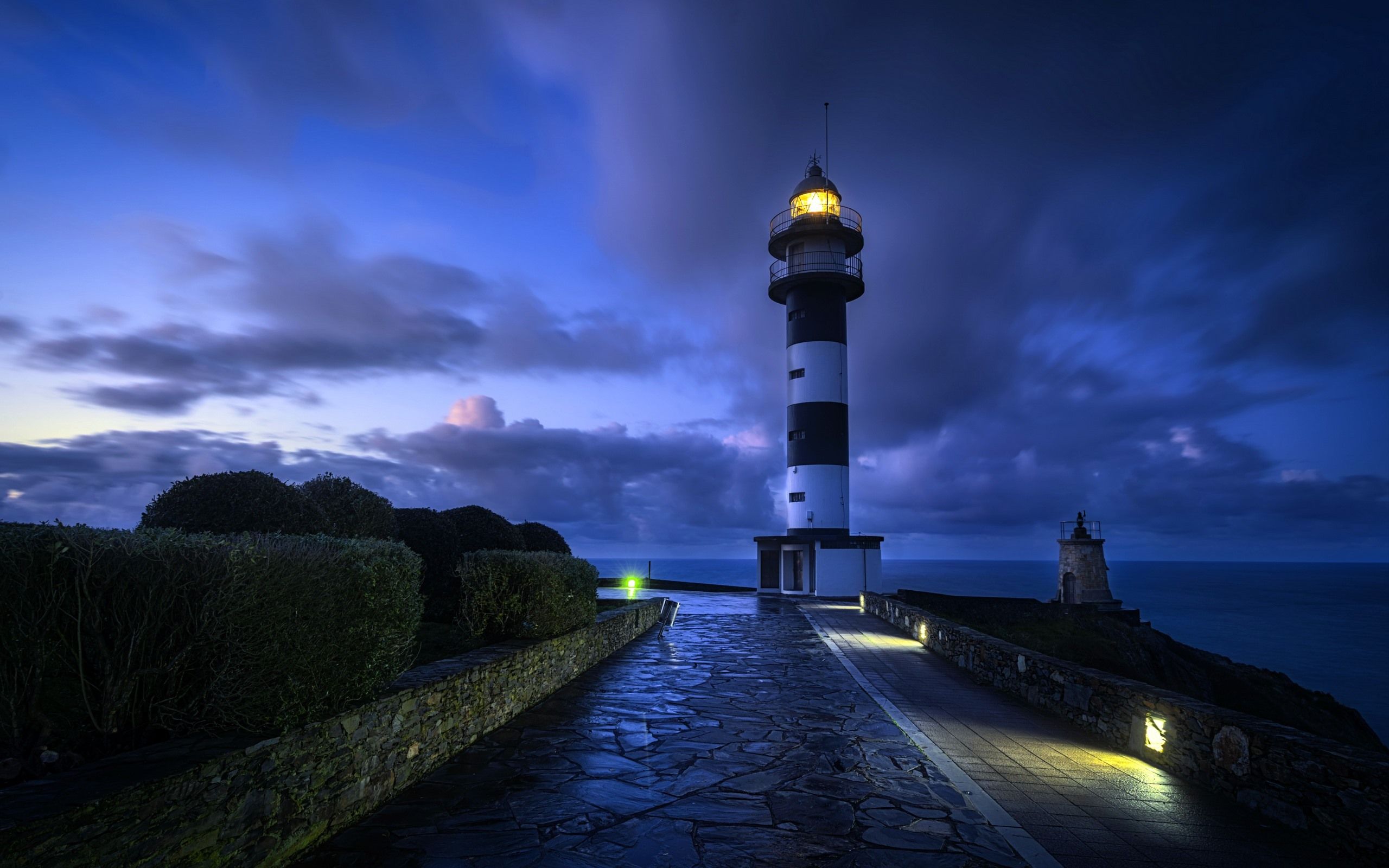 Wallpaper Lighthouse, clouds, night, lights, sea 2560x1600 HD