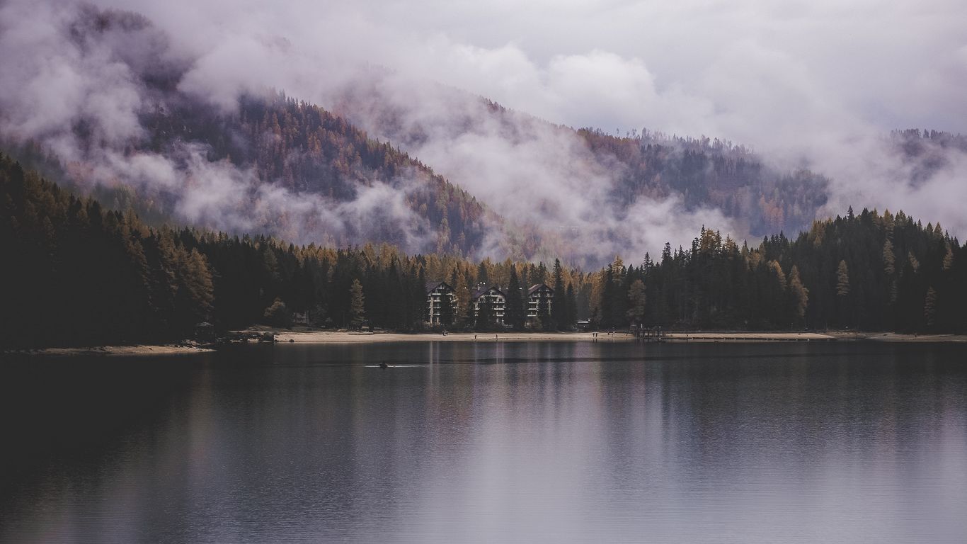 Download wallpaper 1366x768 lake, shore, mountains, clouds, trees