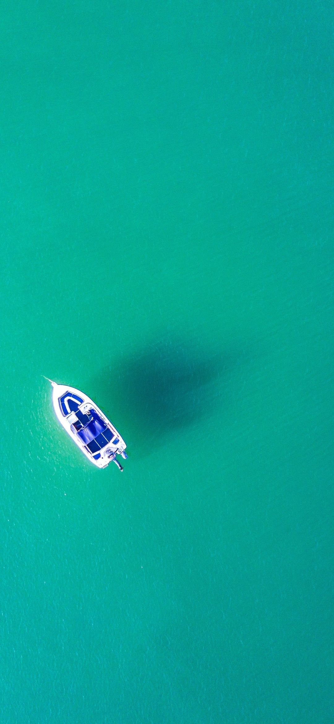 Boat In Blue Sea Water 1080x2340 Resolution Wallpaper