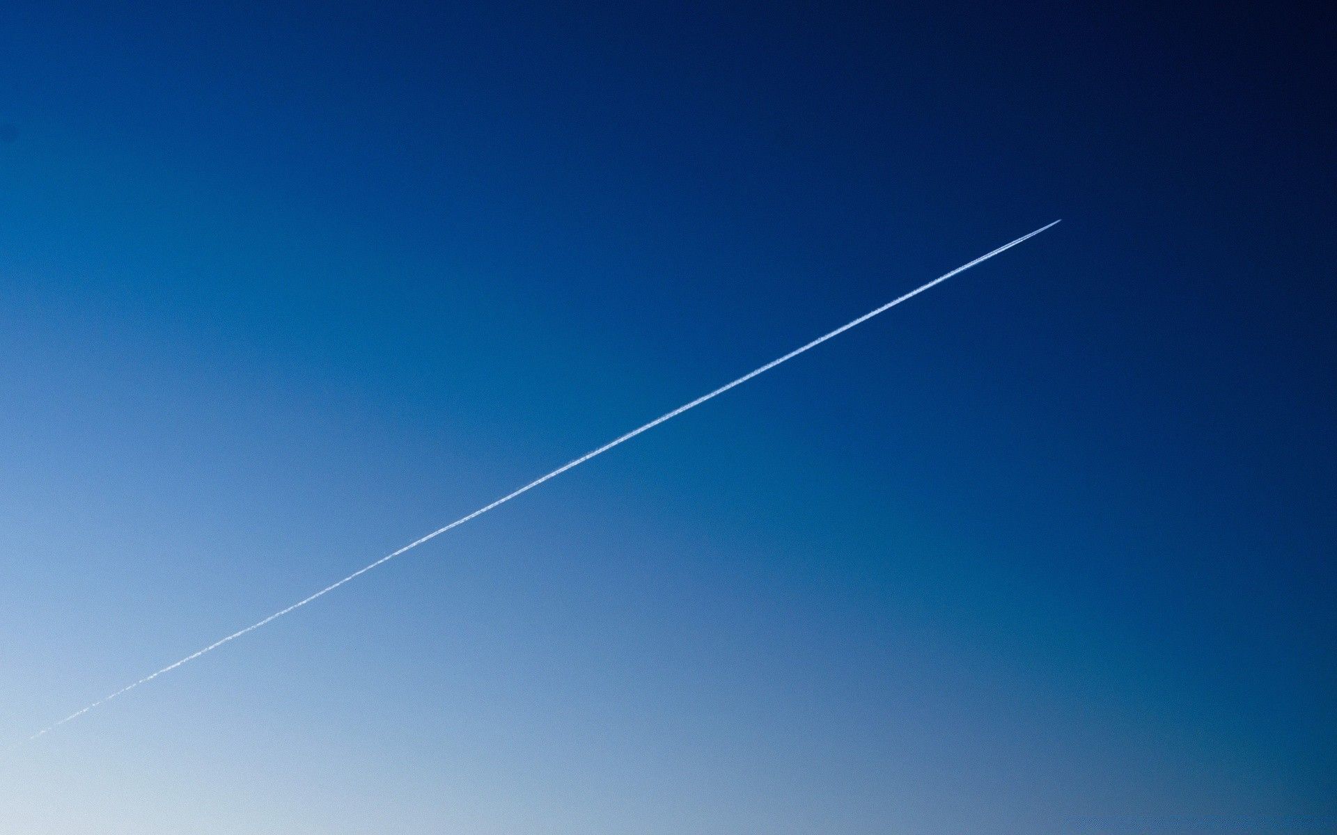 Sky Gradient. And Trace of an Airplane