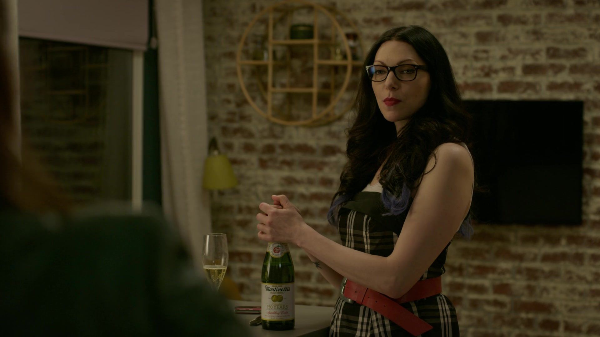Martinelli's Sparkling Cider Enjoyed by Laura Prepon as Alex Vause