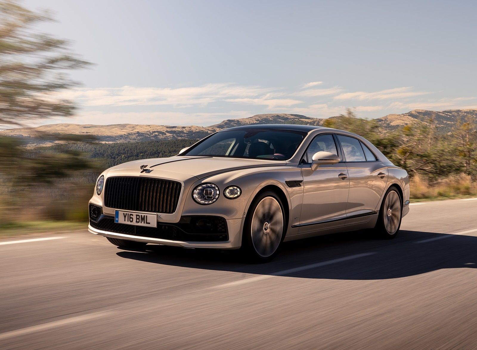 Bentley Flying Spur (Color: White Sand) Front Three Quarter