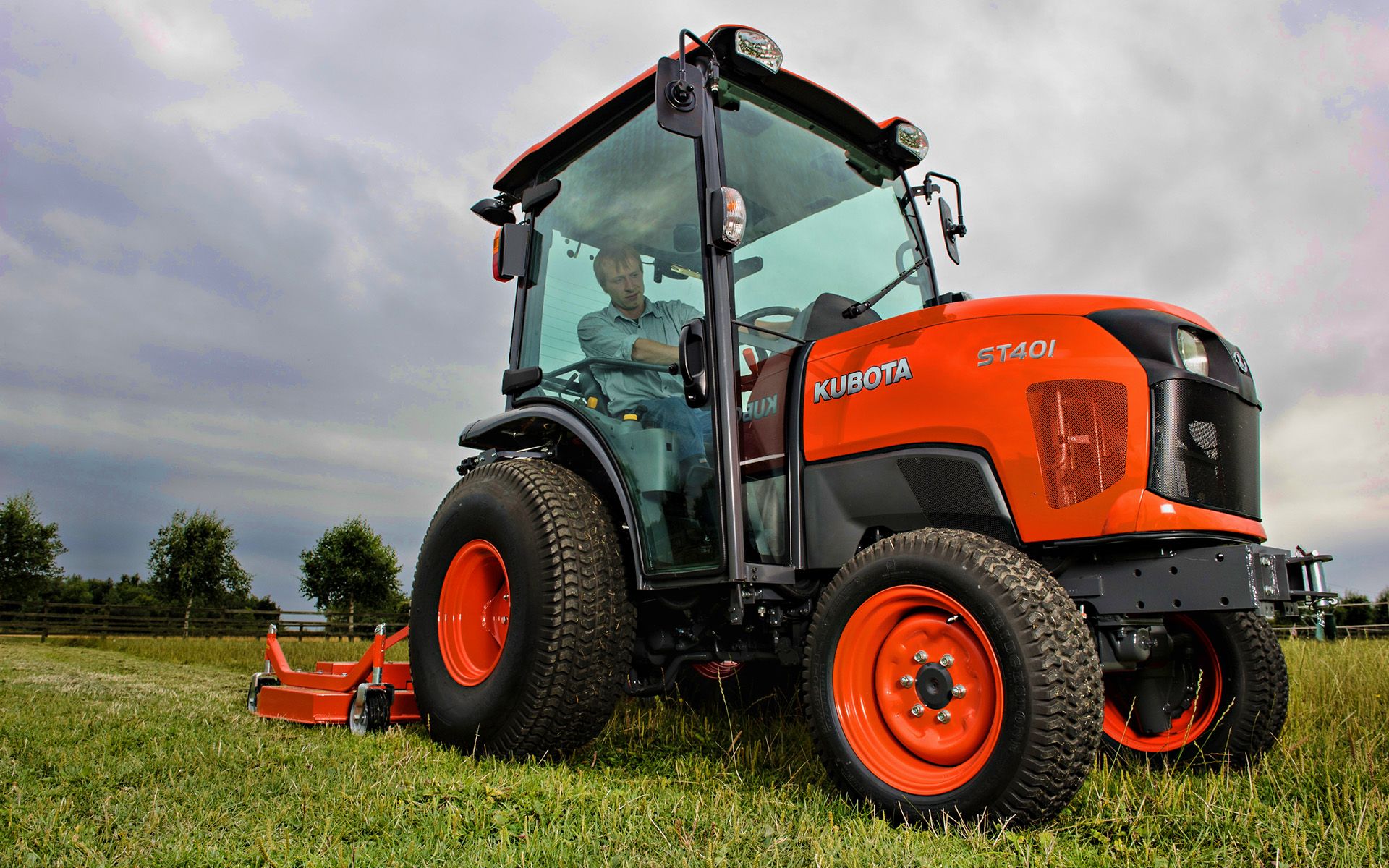 Download wallpapers Kubota ST401, picking grass, 2020 tractors.