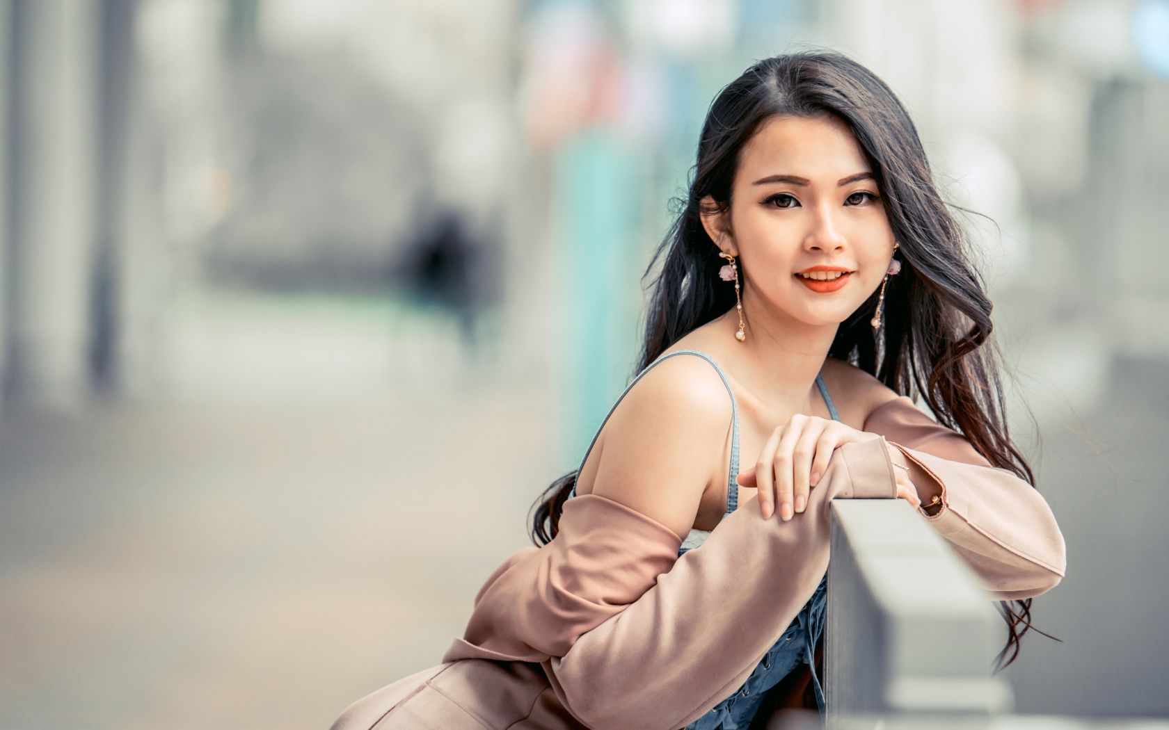 Charming Asian girl sitting on a bench Desktop wallpaper 1680x1050