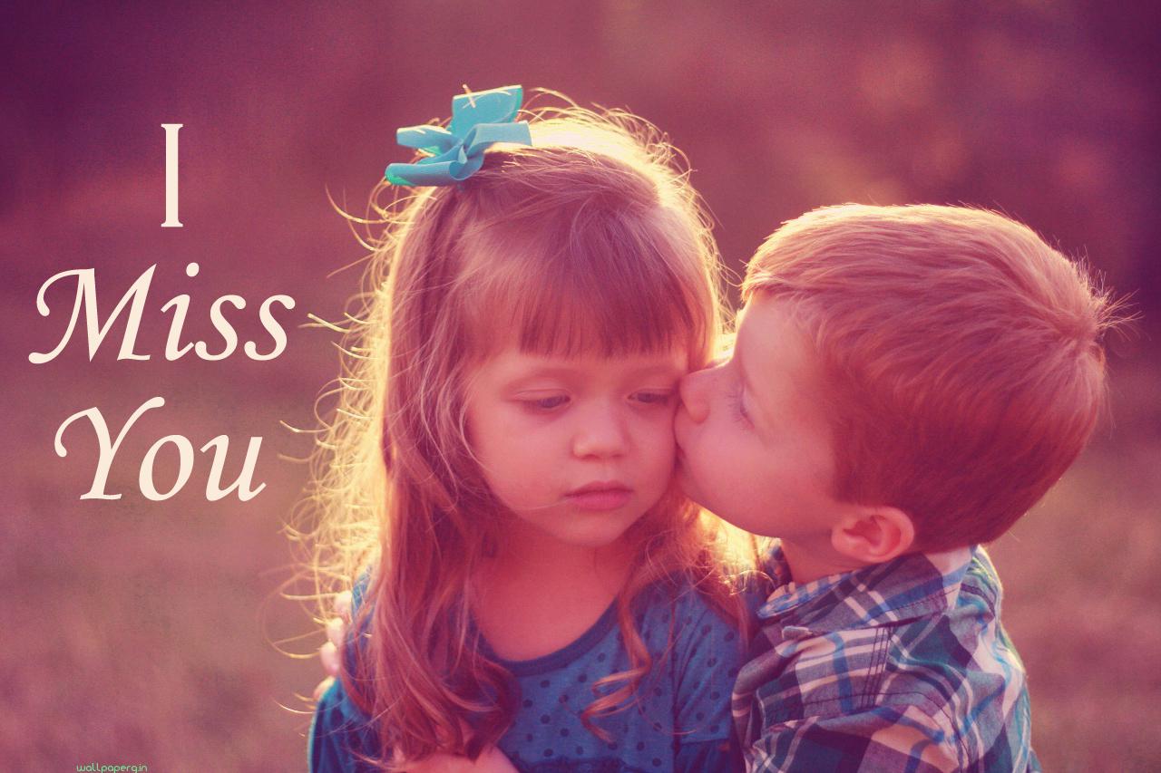 Download I miss you HD wallpaper image with small boy kissing girl you HD wallpaper for your mobile cell phone