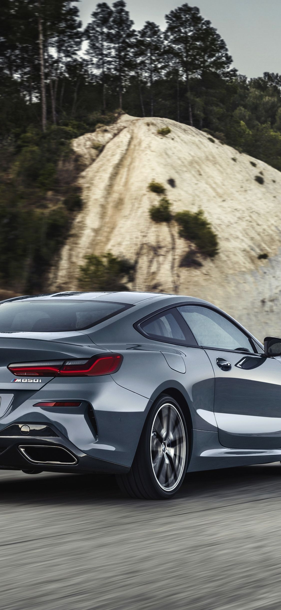 Download 1125x2436 wallpaper bmw 8 series, bmw m850i xdrive, rear