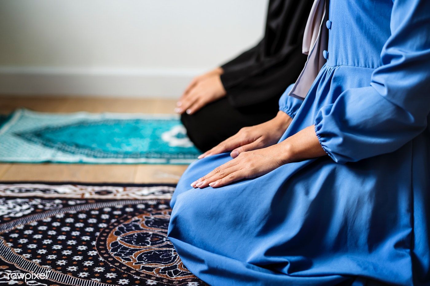 Download premium photo of Muslim prayers in Tashahhud posture
