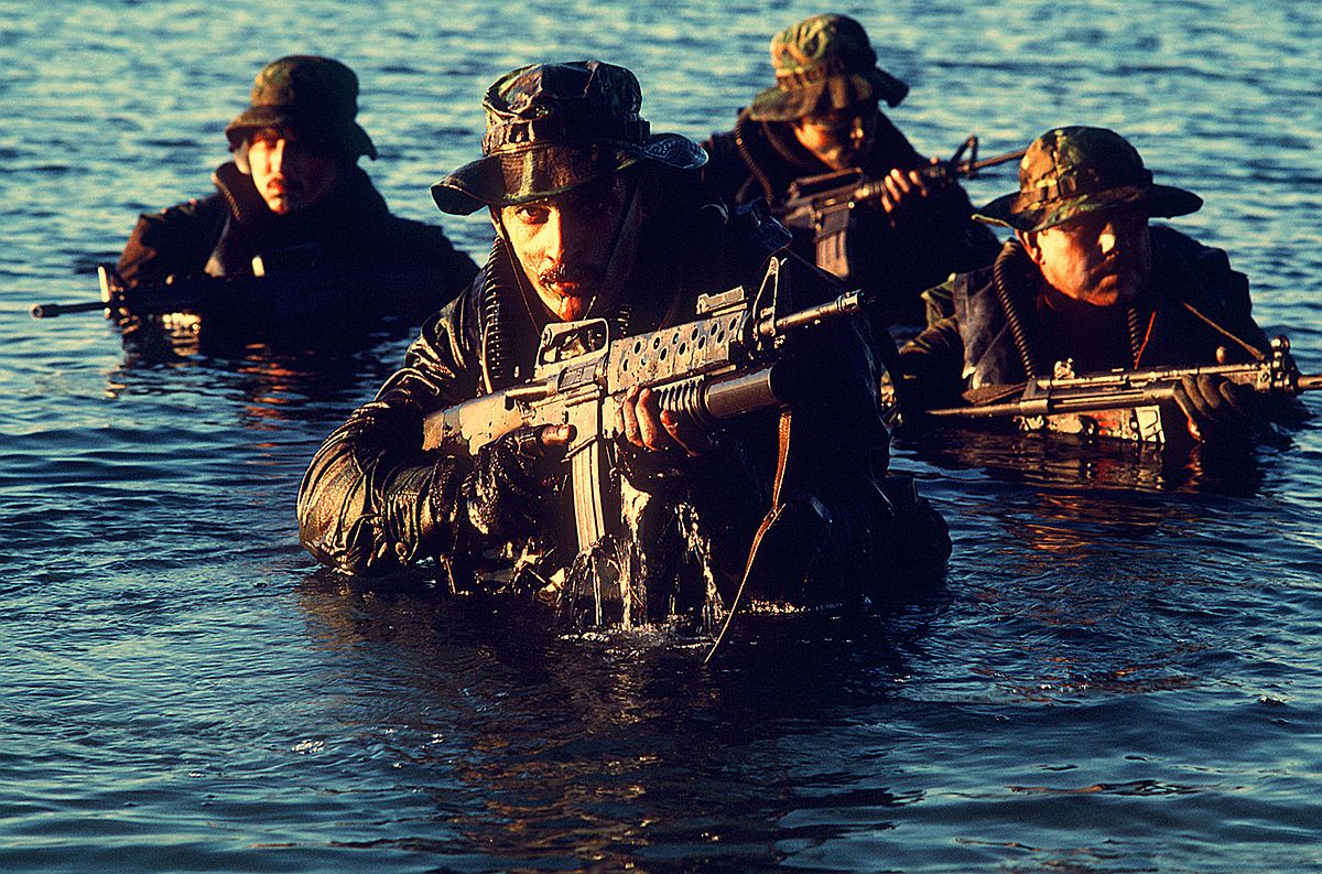 Navy SEALs coming out of water.JPEG