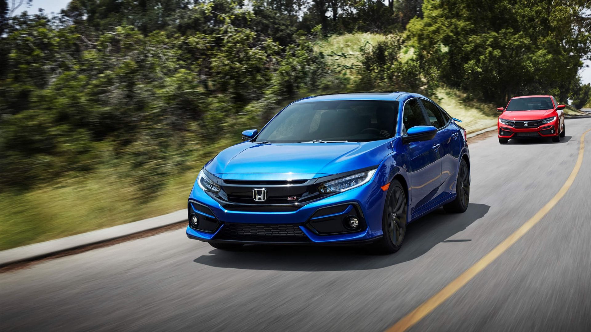 HONDA. Racy Civic Si just wants to have fun