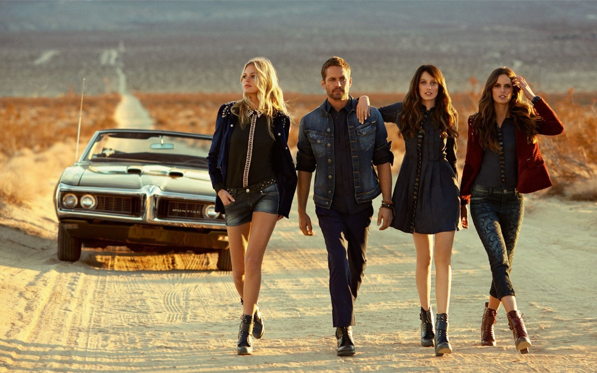 Paul Walker with the girls from the movie Fast and Furious 7