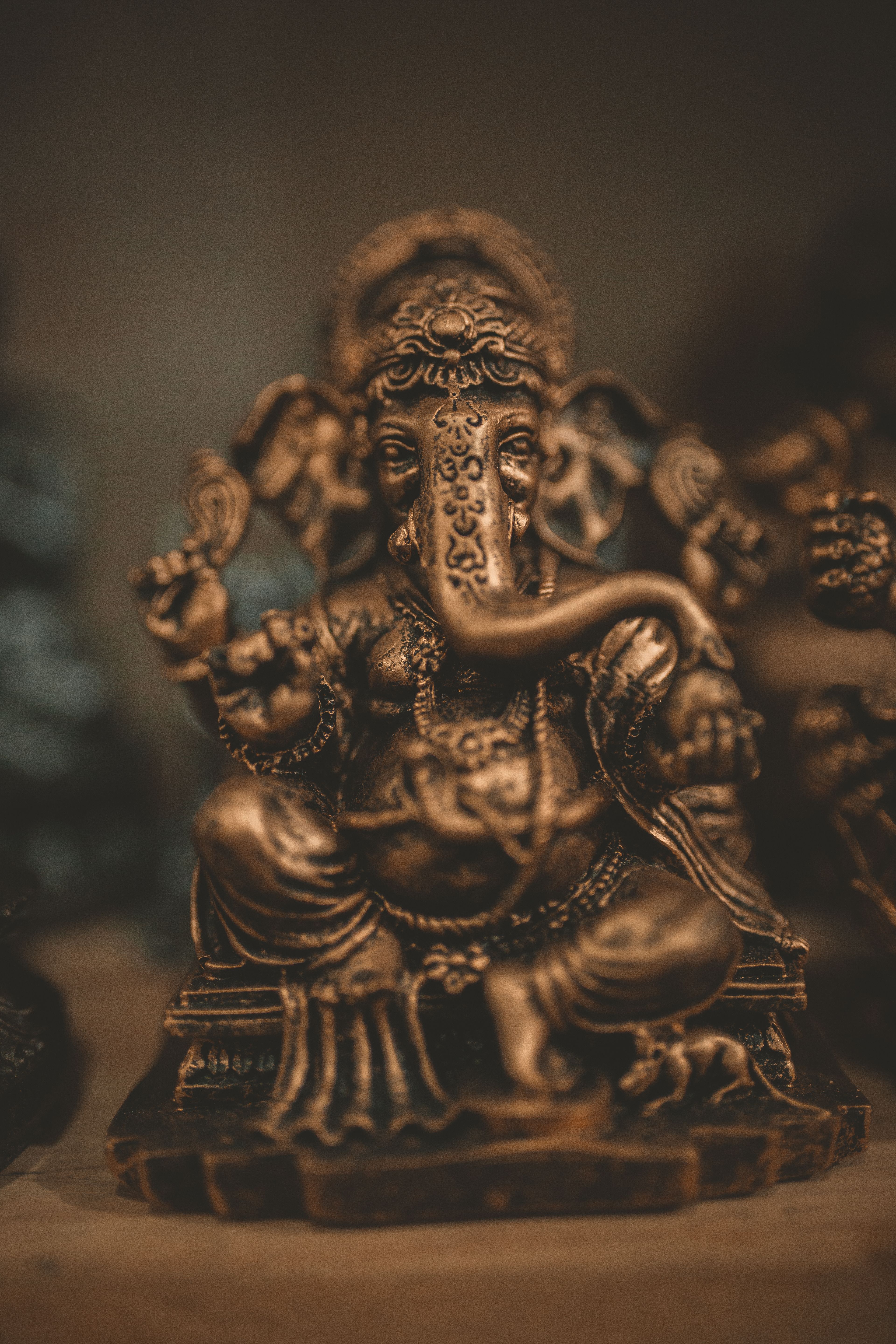 Brass Colored Lord Ganesha Figurine · Free