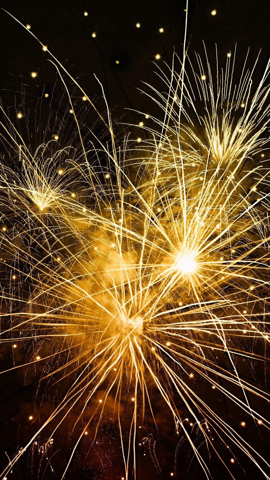 Download wallpaper 938x1668 fireworks, holiday, sparks, rays