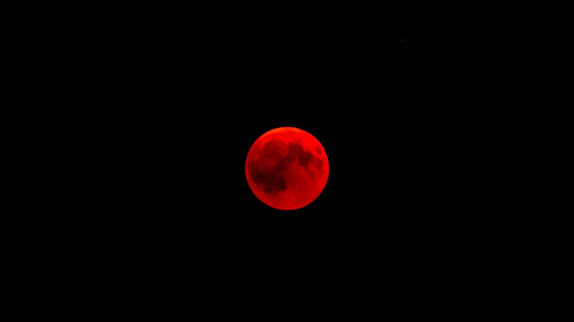 Red Full Moon with Black Background Wallpaper