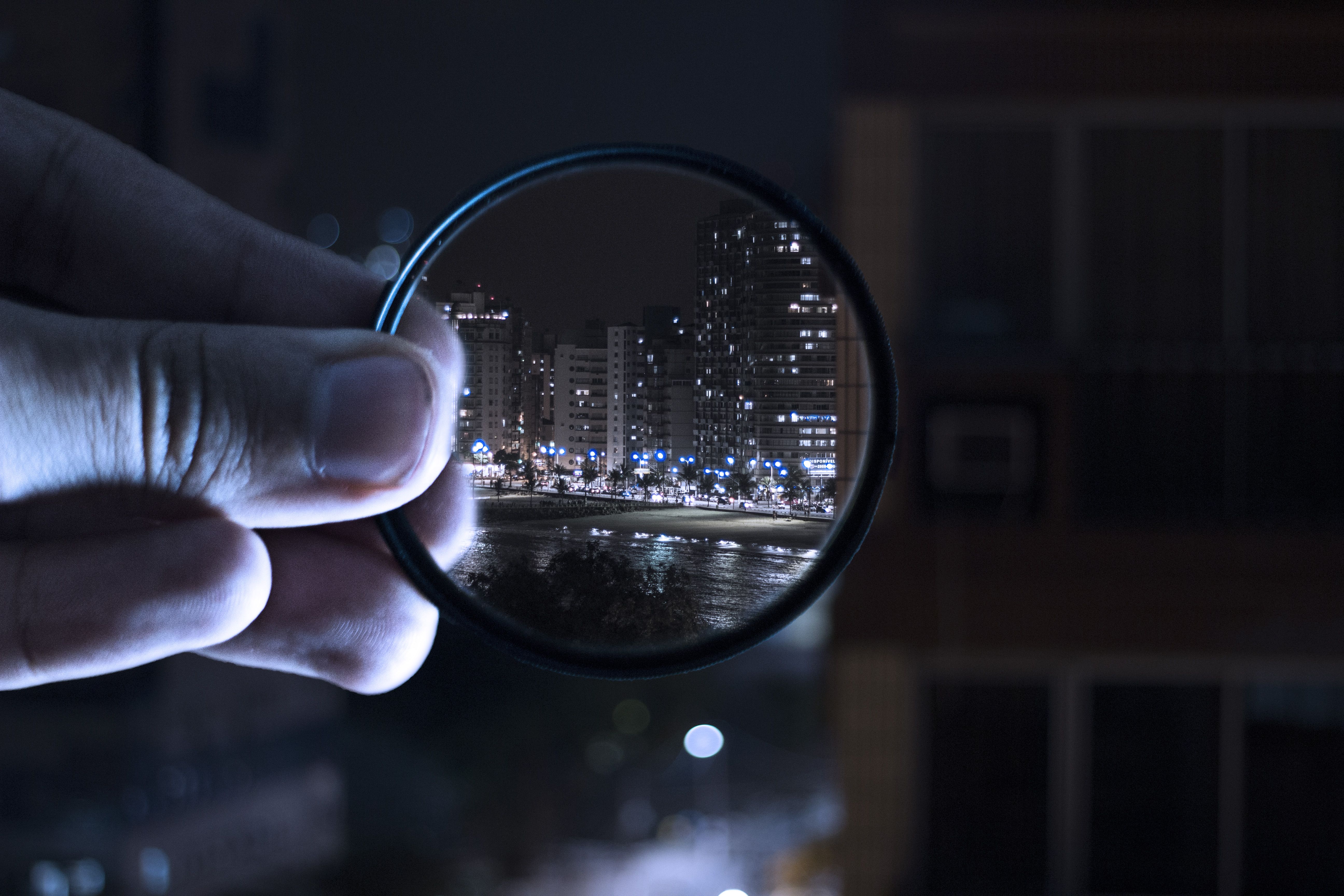 Person Holding Magnifying Glass · Free