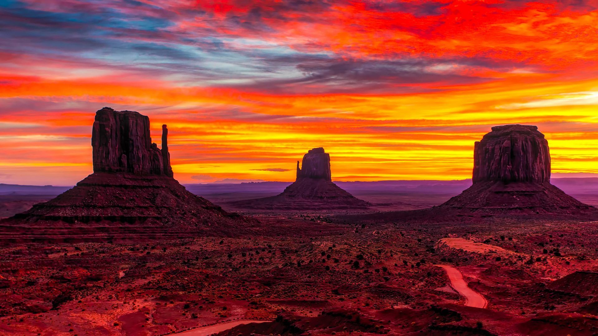 Sunset Monument Valley Desert Region Of Red Sand Arizona Utah
