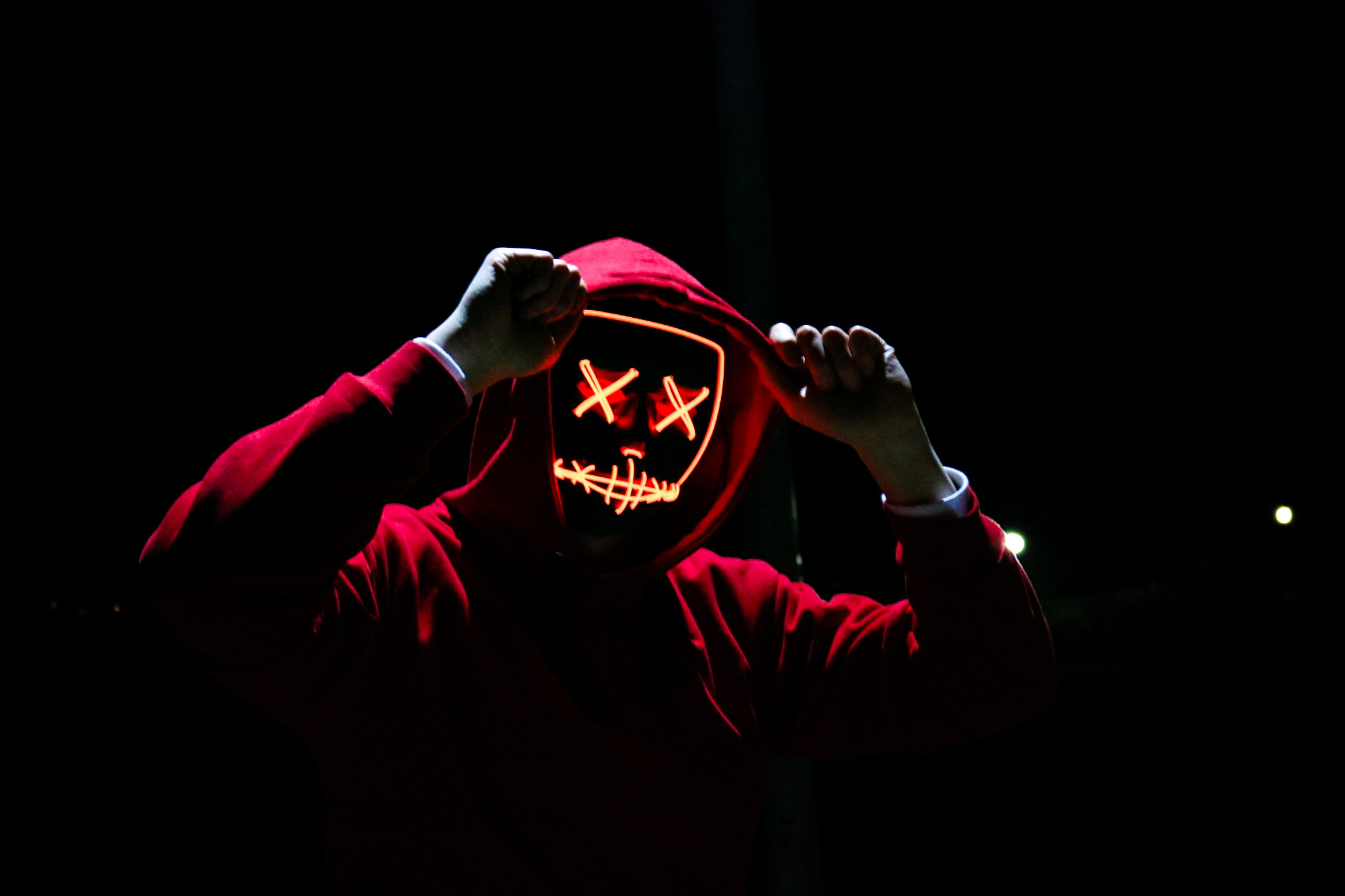 5999x3999 #red, #skull face, #mask, #illustration, #cool, #illuminated, #dead, #lines, #creepy, #halloween pumpkin, #Free picture, #halloween, #hoodie, #dark background, #neon light, #face, #light, #person, #angry, #skull, #dark. Mocah.org HD