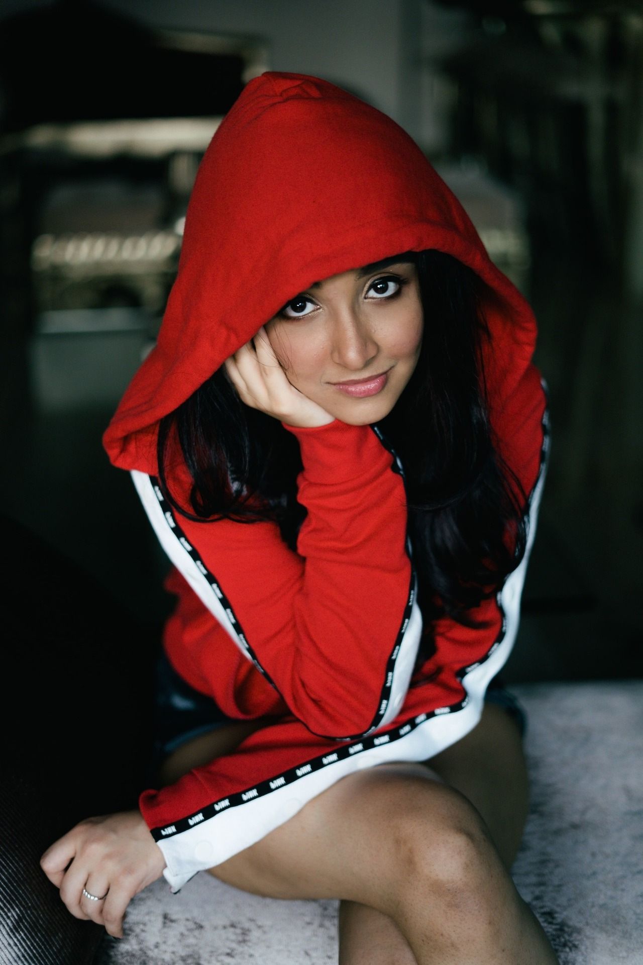 Woman Wearing White and Red Hoodie Wallpaper