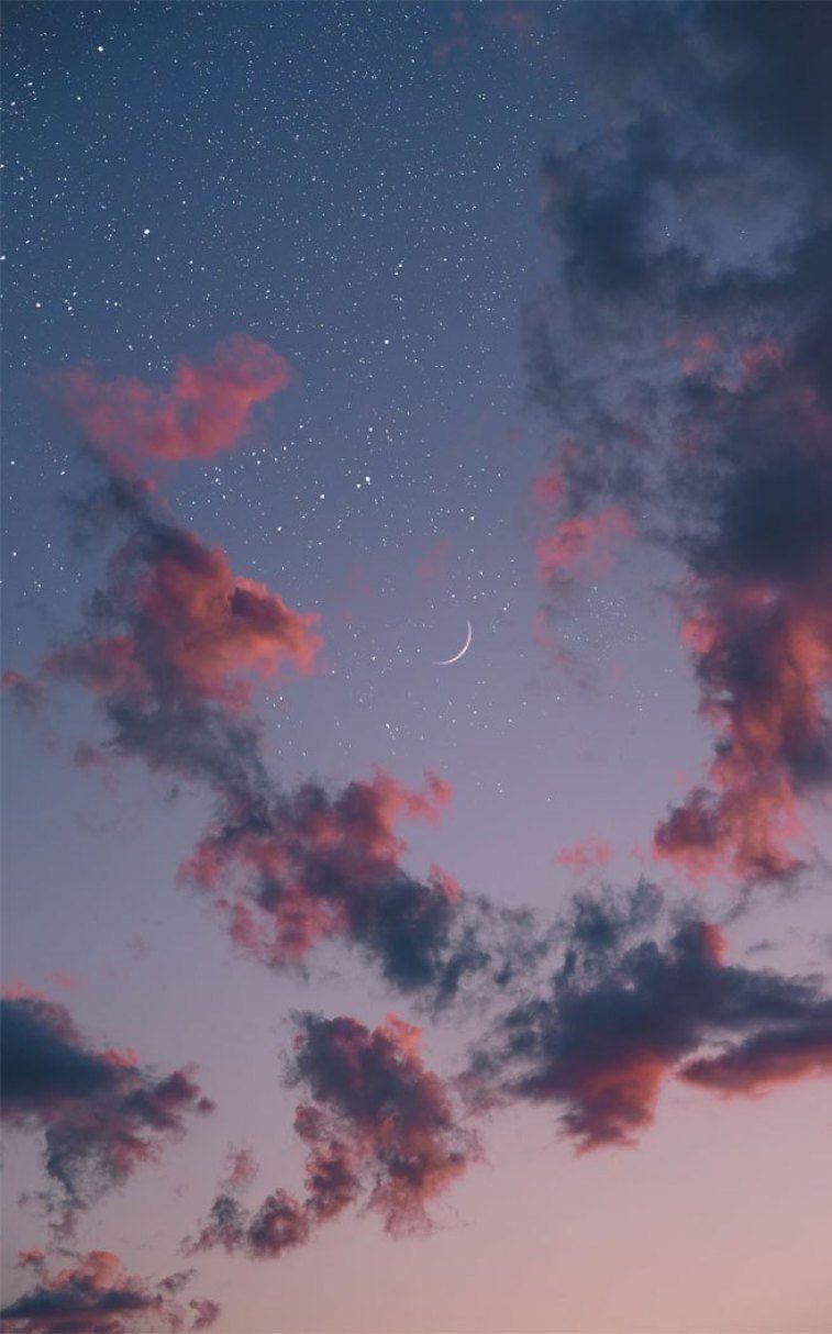 Beautiful evening sky with crescent moon and stars