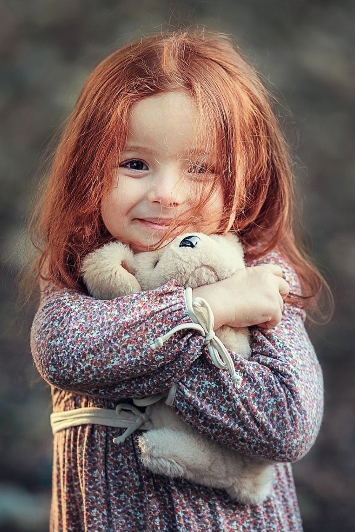 Little cute girl hug to small teddy nice picture mobile wallpaper