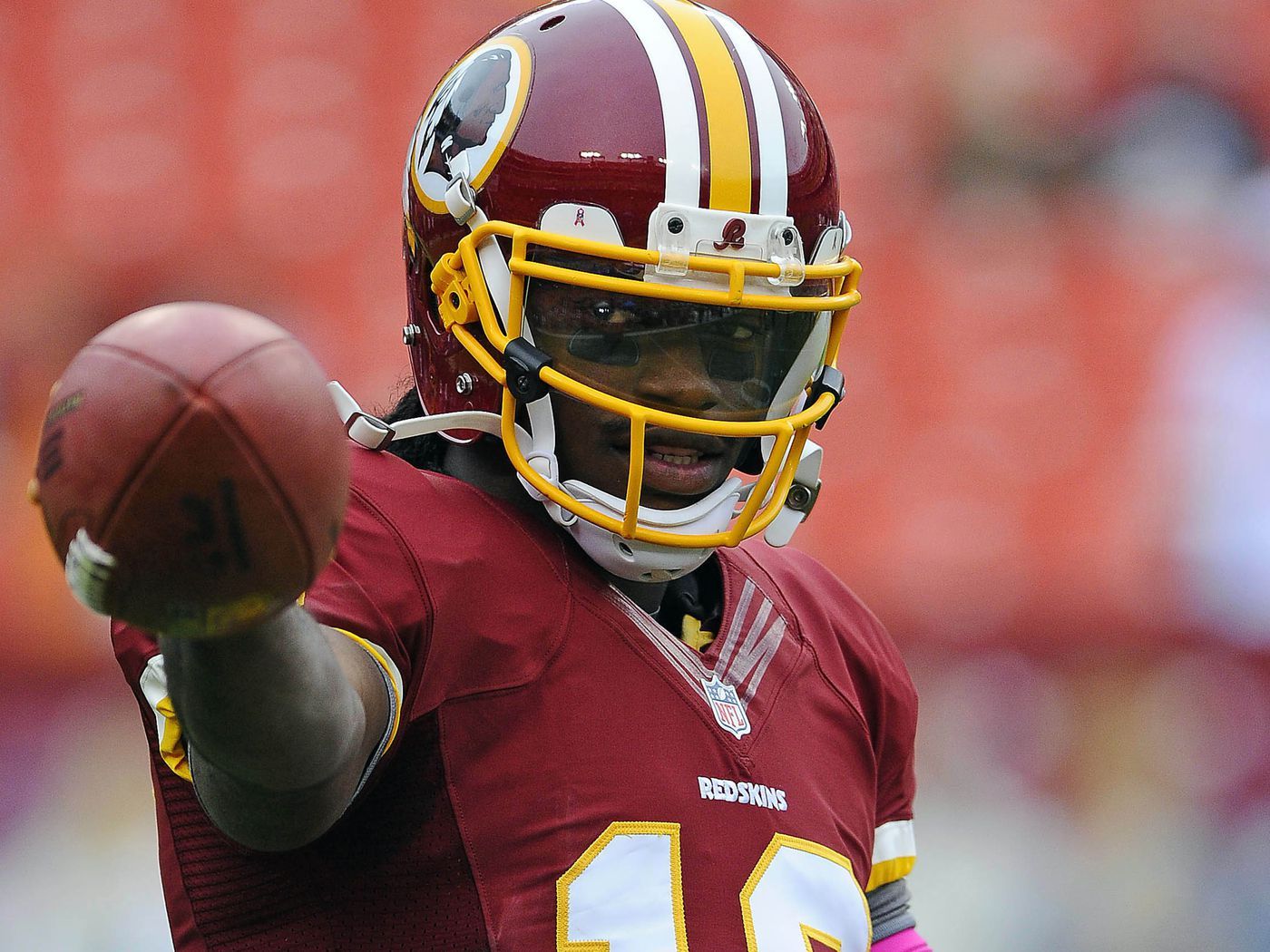 RG3 Injury: Robert Griffin III heads to locker room after big hit