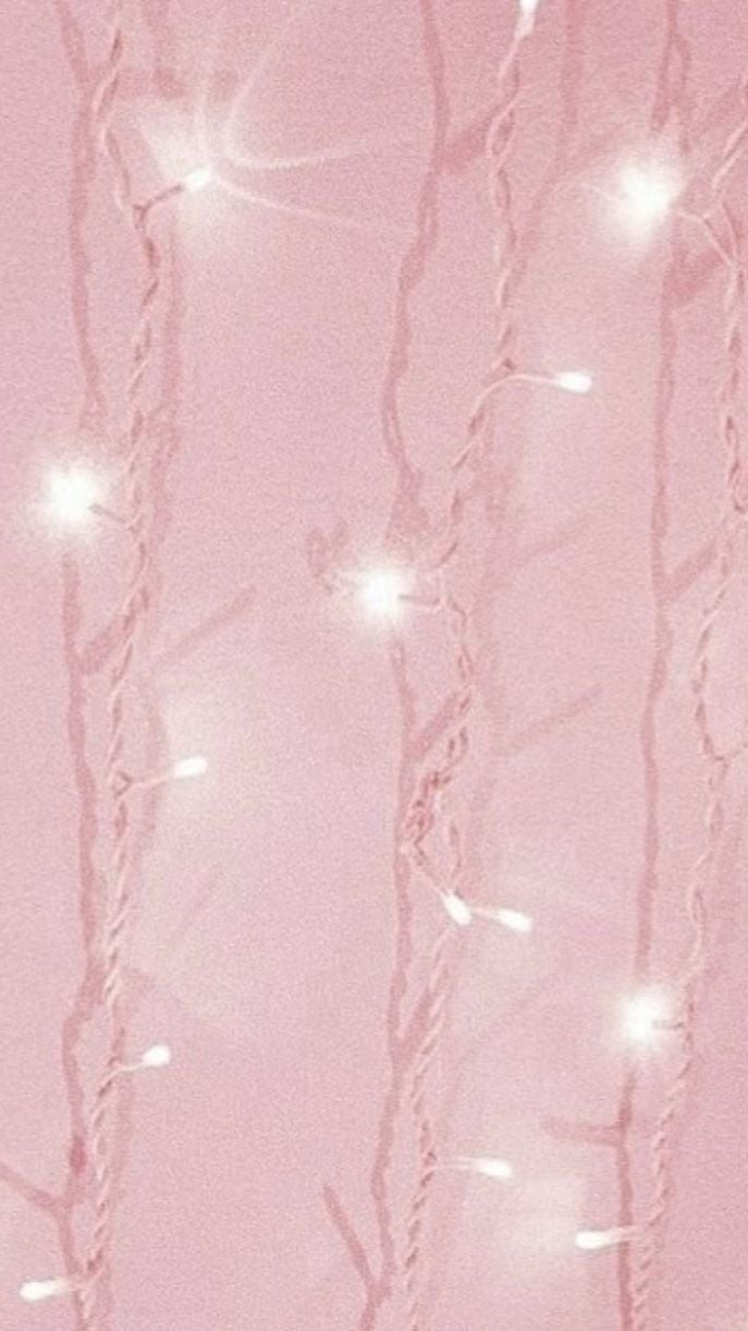 This pink wallpaper background is perfect for a pink aesthetic during pink Xmas! Who doe. Pink christmas lights, Christmas lights wallpaper, Pastel pink aesthetic