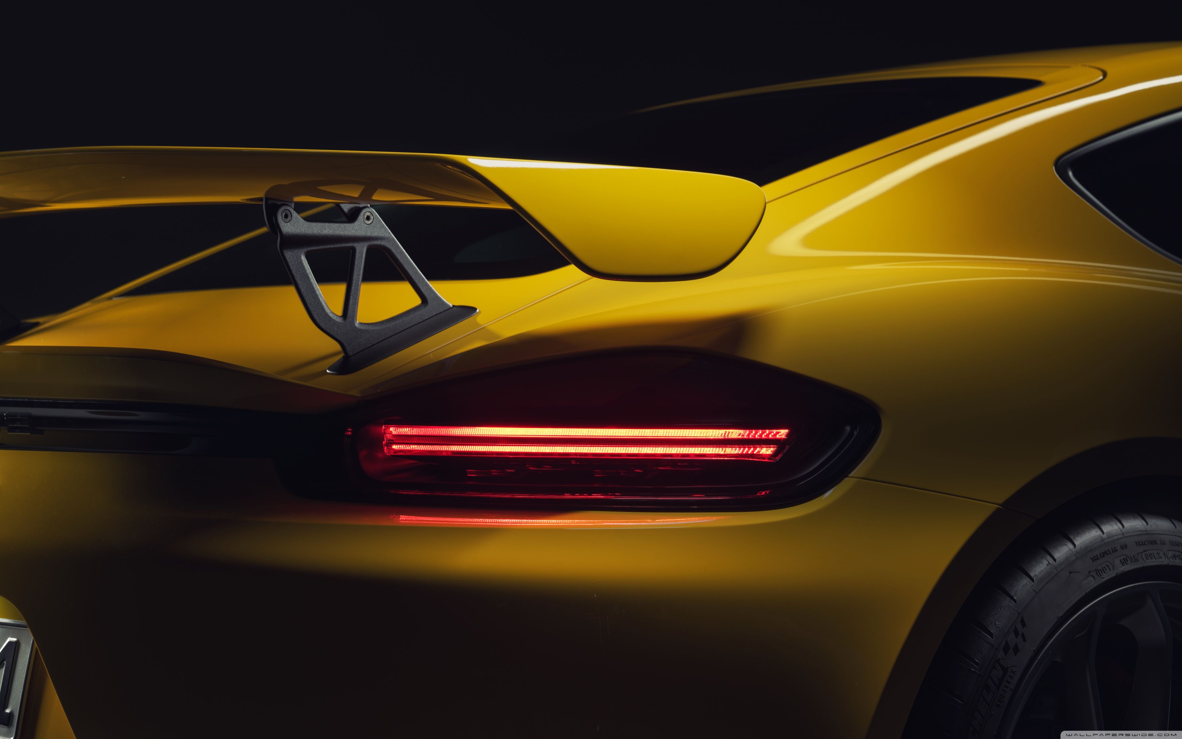 Download 2019 Yellow Porsche 718 Cayman GT4 Sports Car. UltraHD
