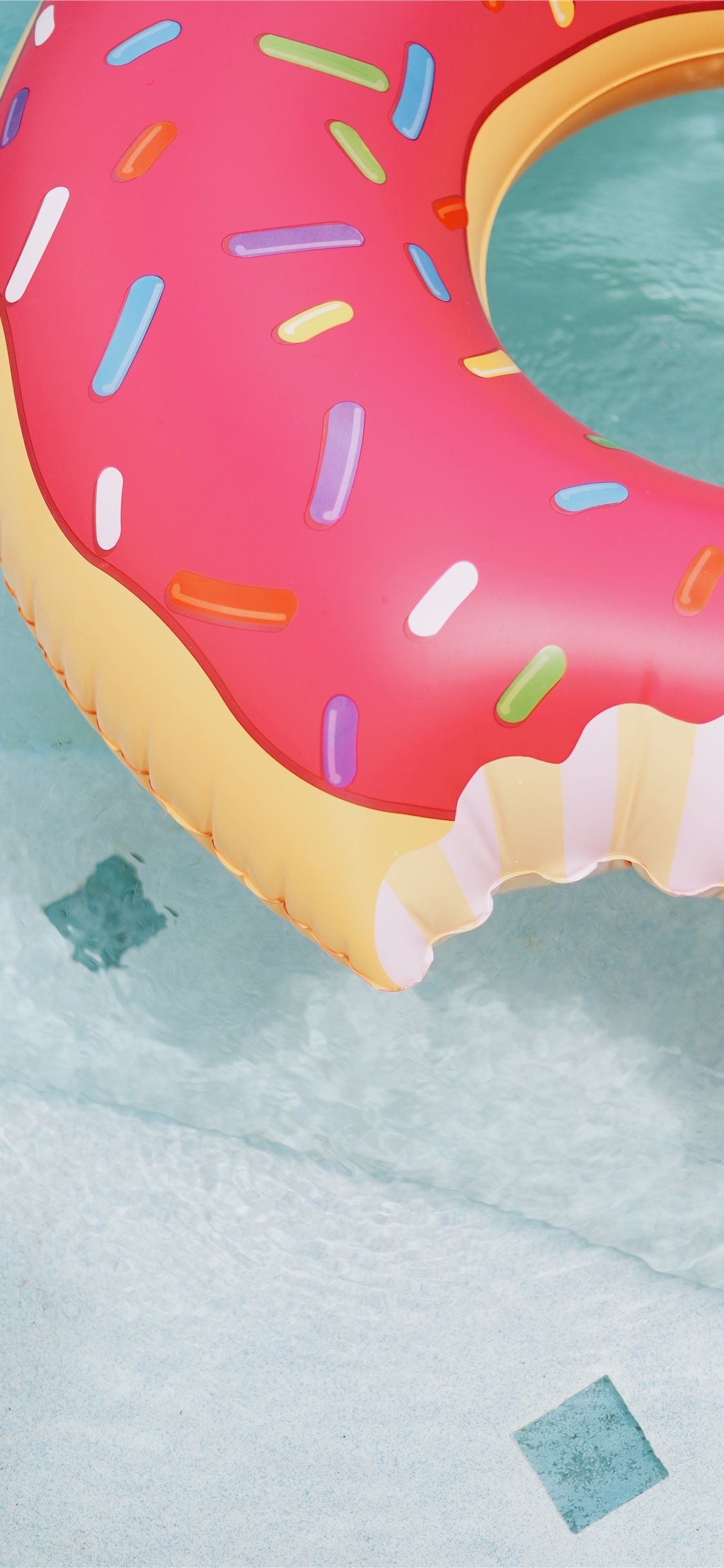 donut floatie in pool iPhone X Wallpaper Free Download