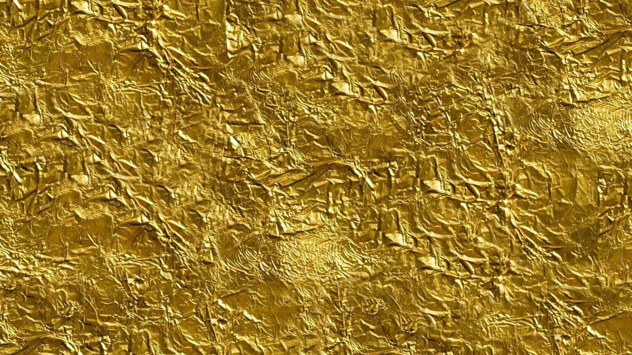 Gold Foil Background Background for Free PowerPoint