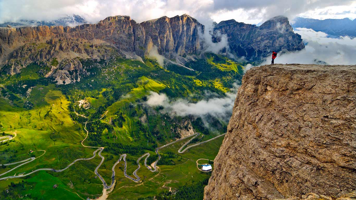 Trekker on the Sella Group mountain chain, Dolomites, South Tyrol