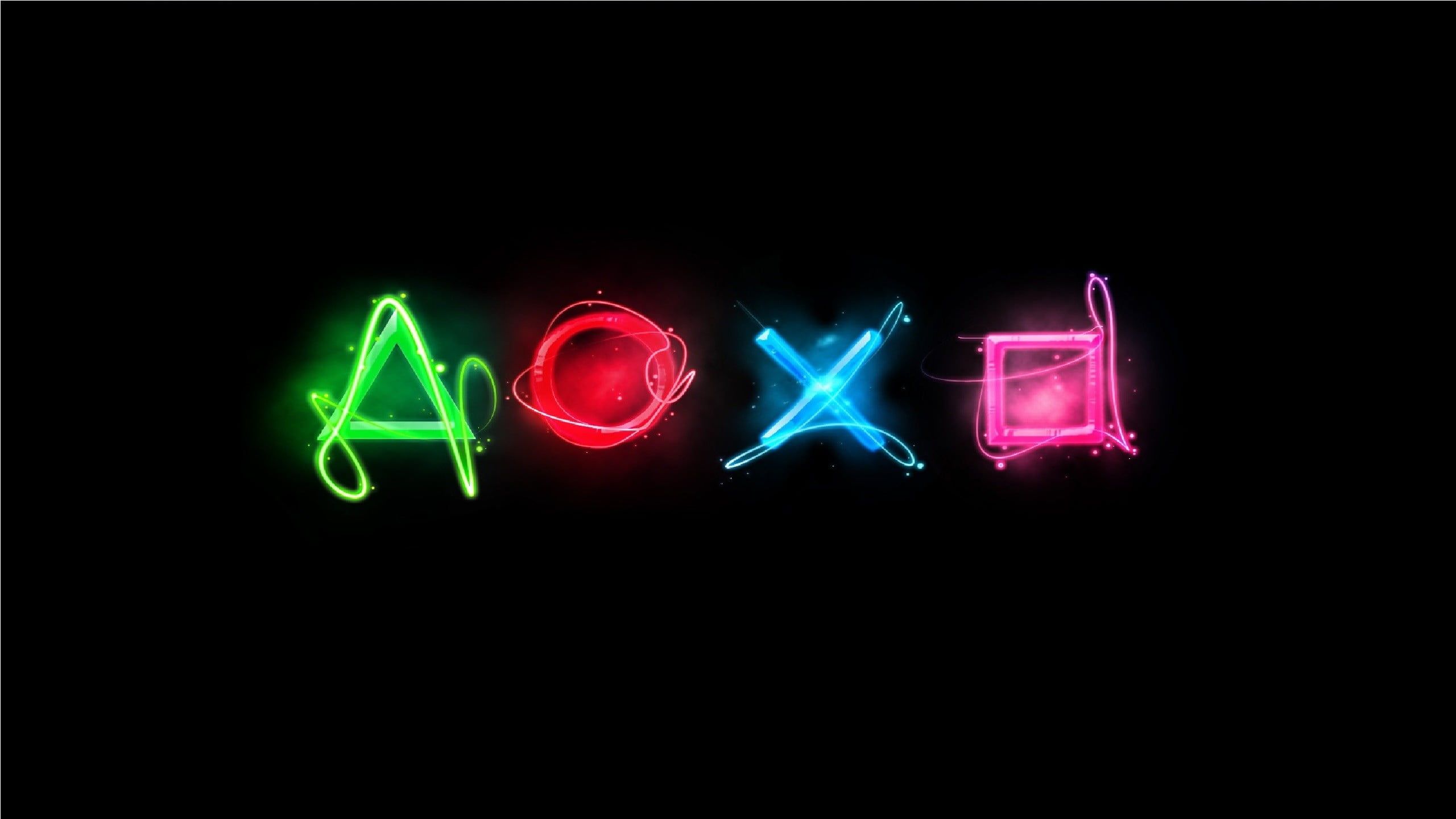 red, blue, pink, and green Playstation controller logo
