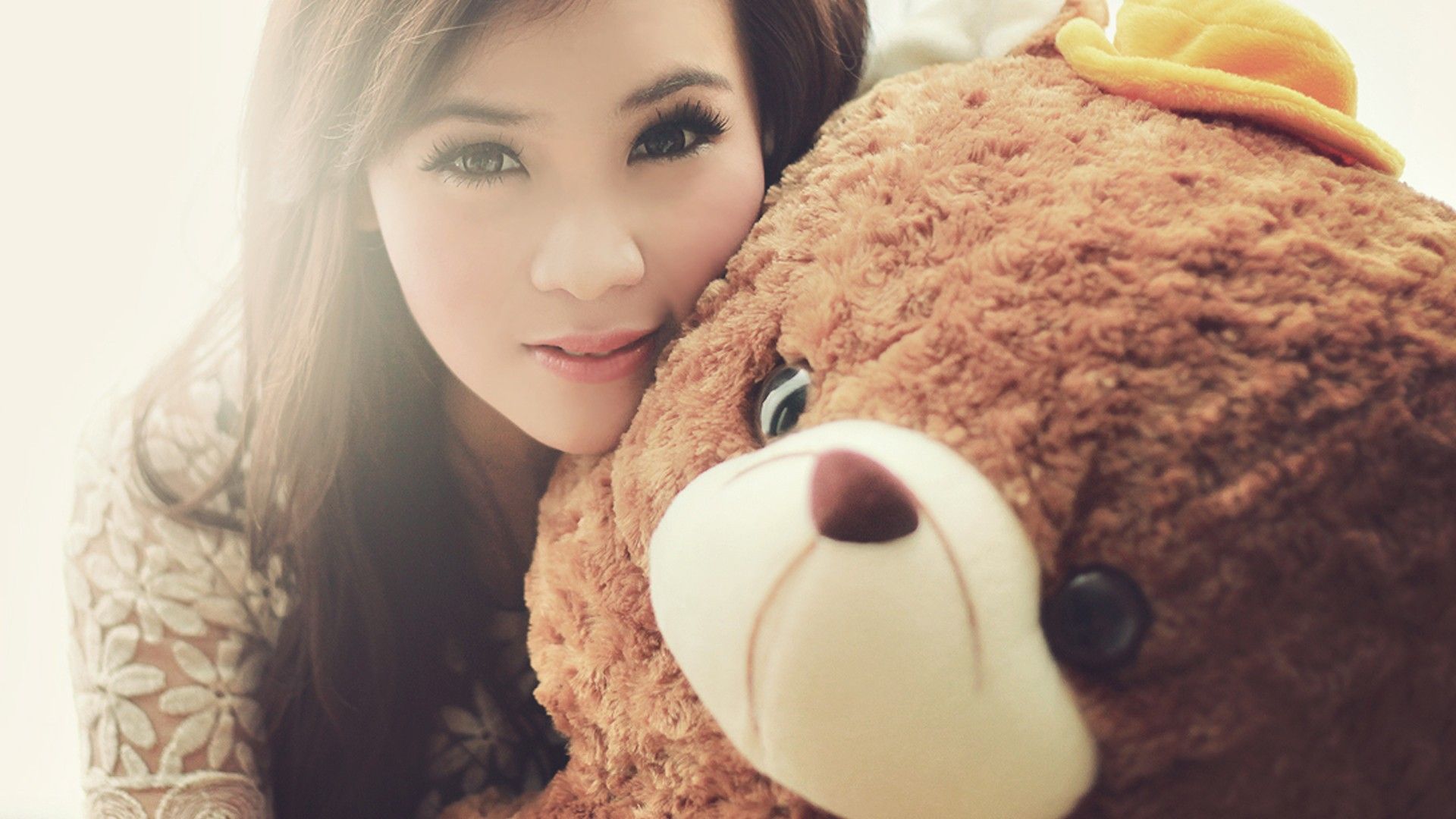 girls with teddy bear