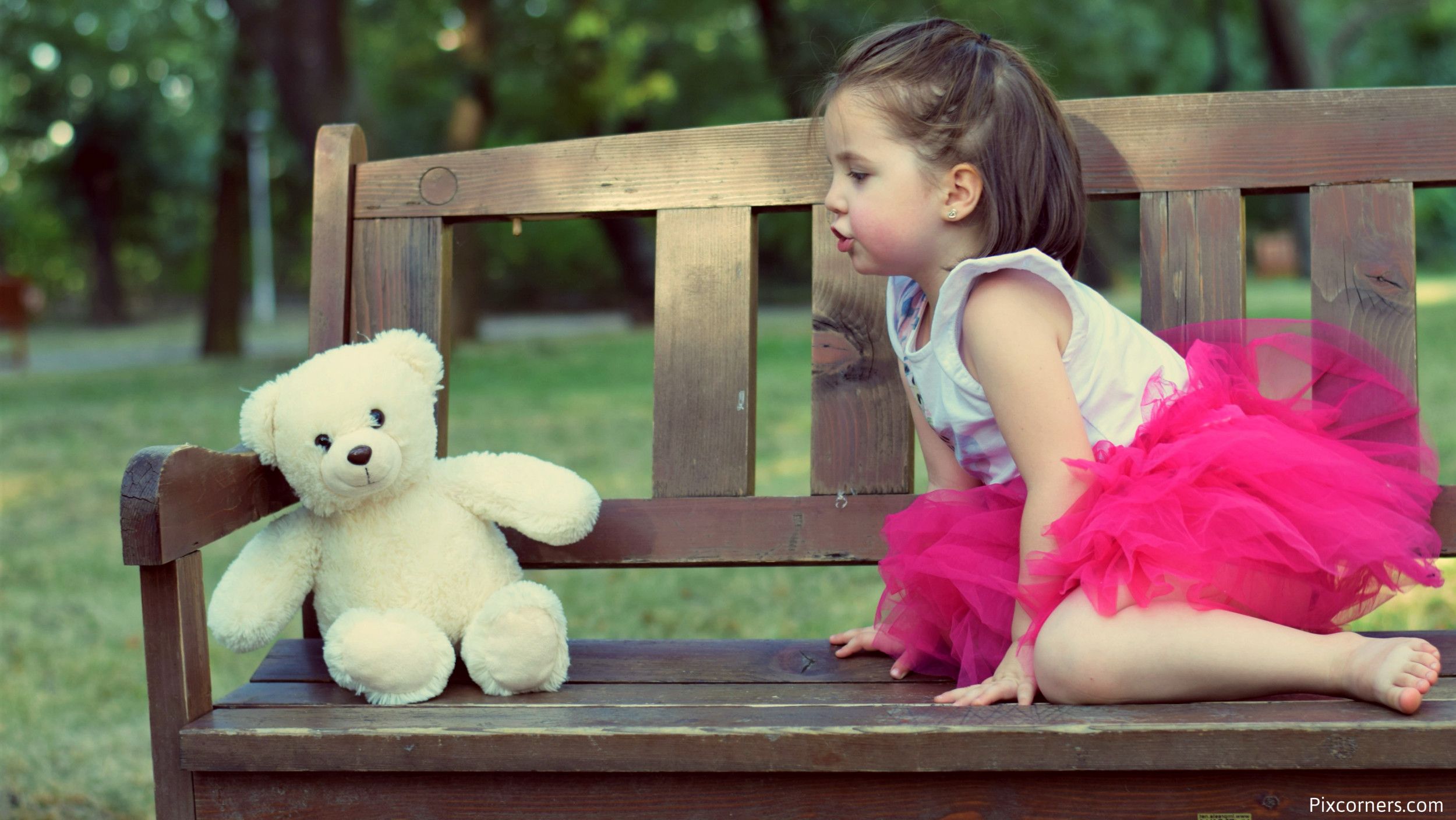 Cute Baby Girl With Teddy Bear Wallpaper