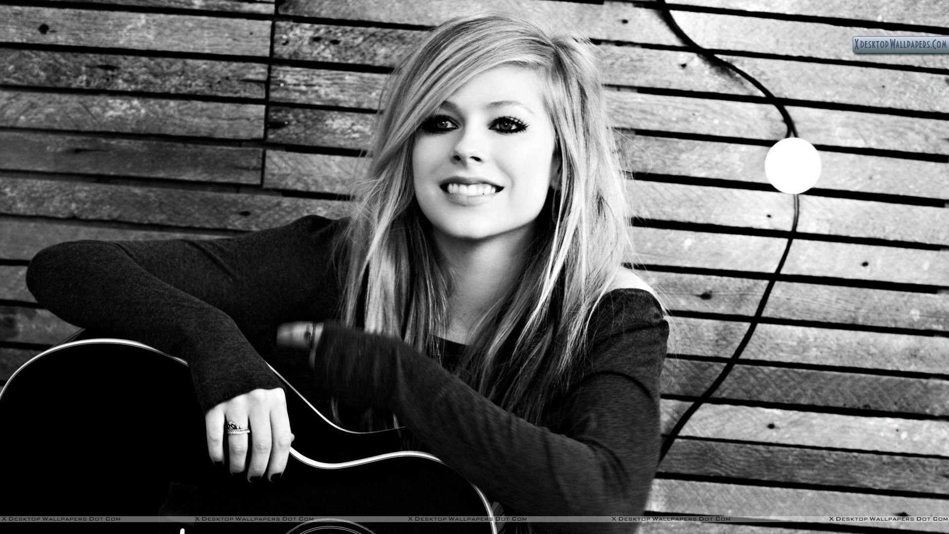 Avril Lavigne Black & White Smiling in Winter Dress Wallpaper
