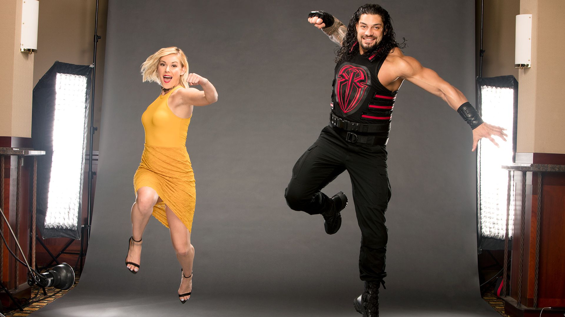 PsBattle: WWE's Roman Reigns & Renee Young poses for a Superman Punch