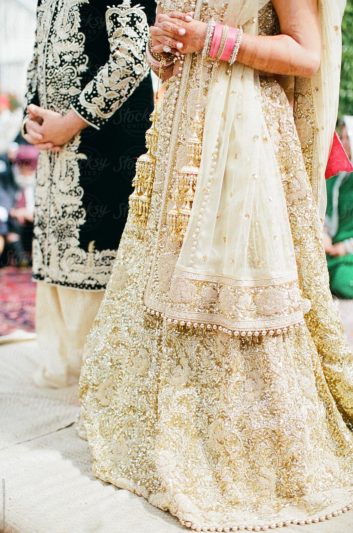 Indian couple during ceremony by Seth Mourra, Wedding