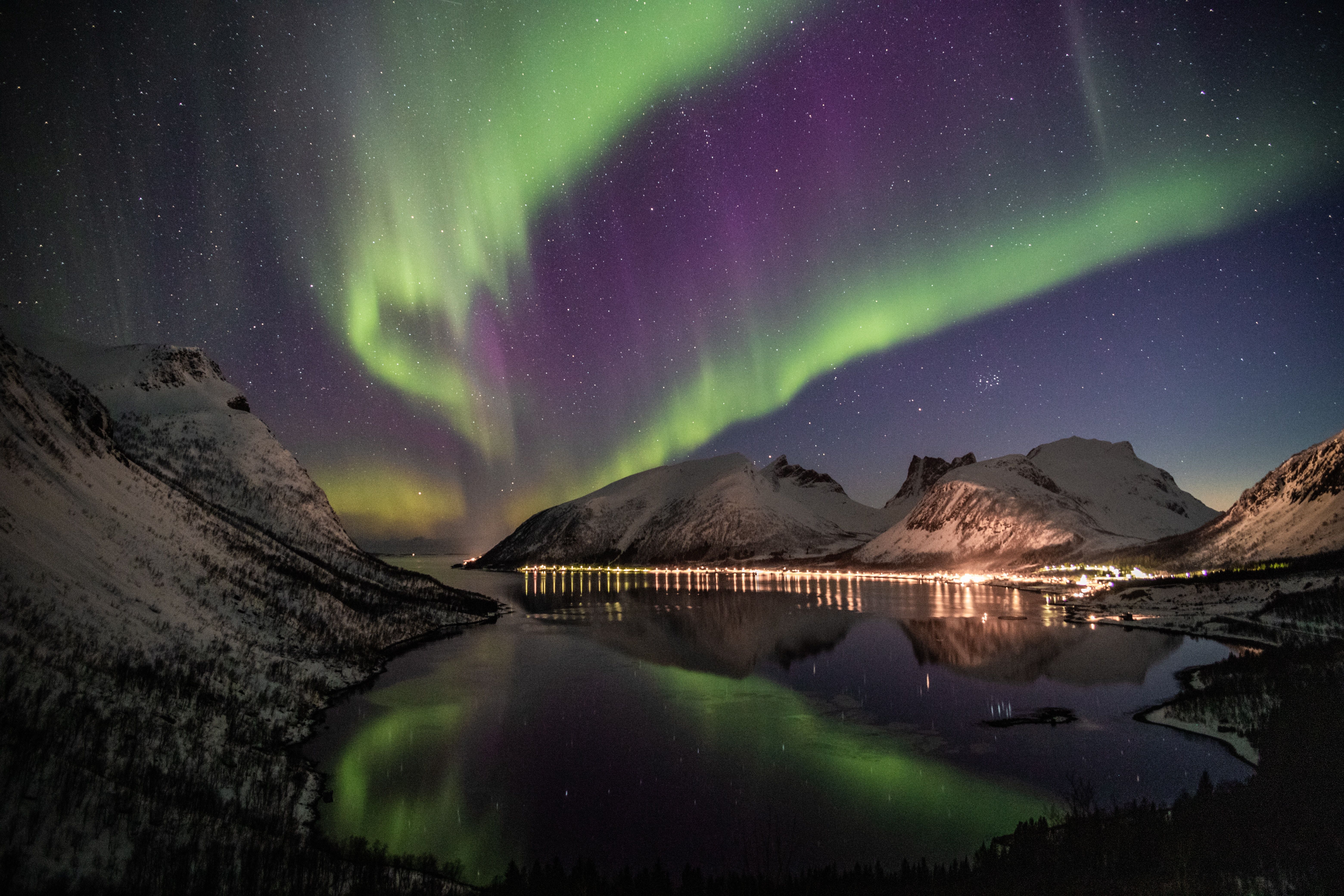 Northern Lights Near Snow Coated Mountains · Free