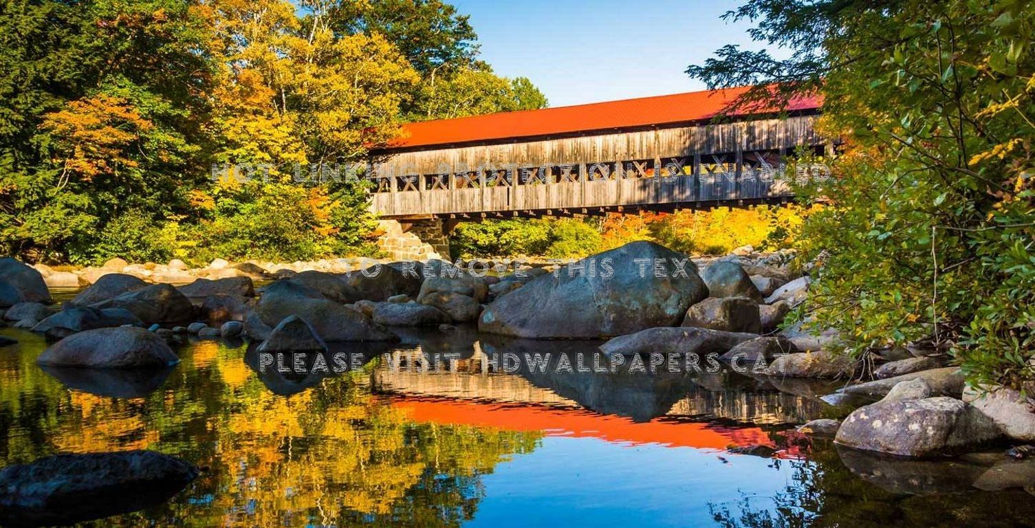 covered bridge in new england colors autumn