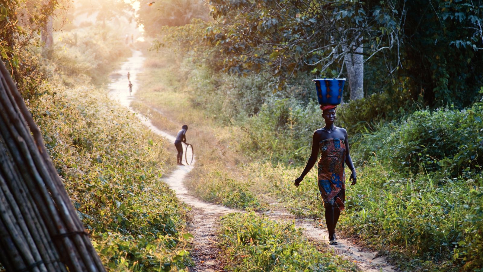 African Woman Carrying Water