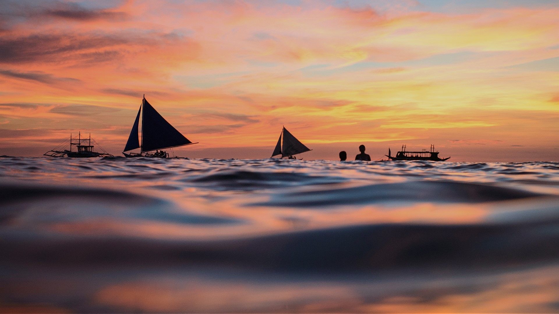 Ocean surface during sunset, Boracay, Malay, Aklan, Western Visayas, Phillipines. Windows 10 Spotlight Image