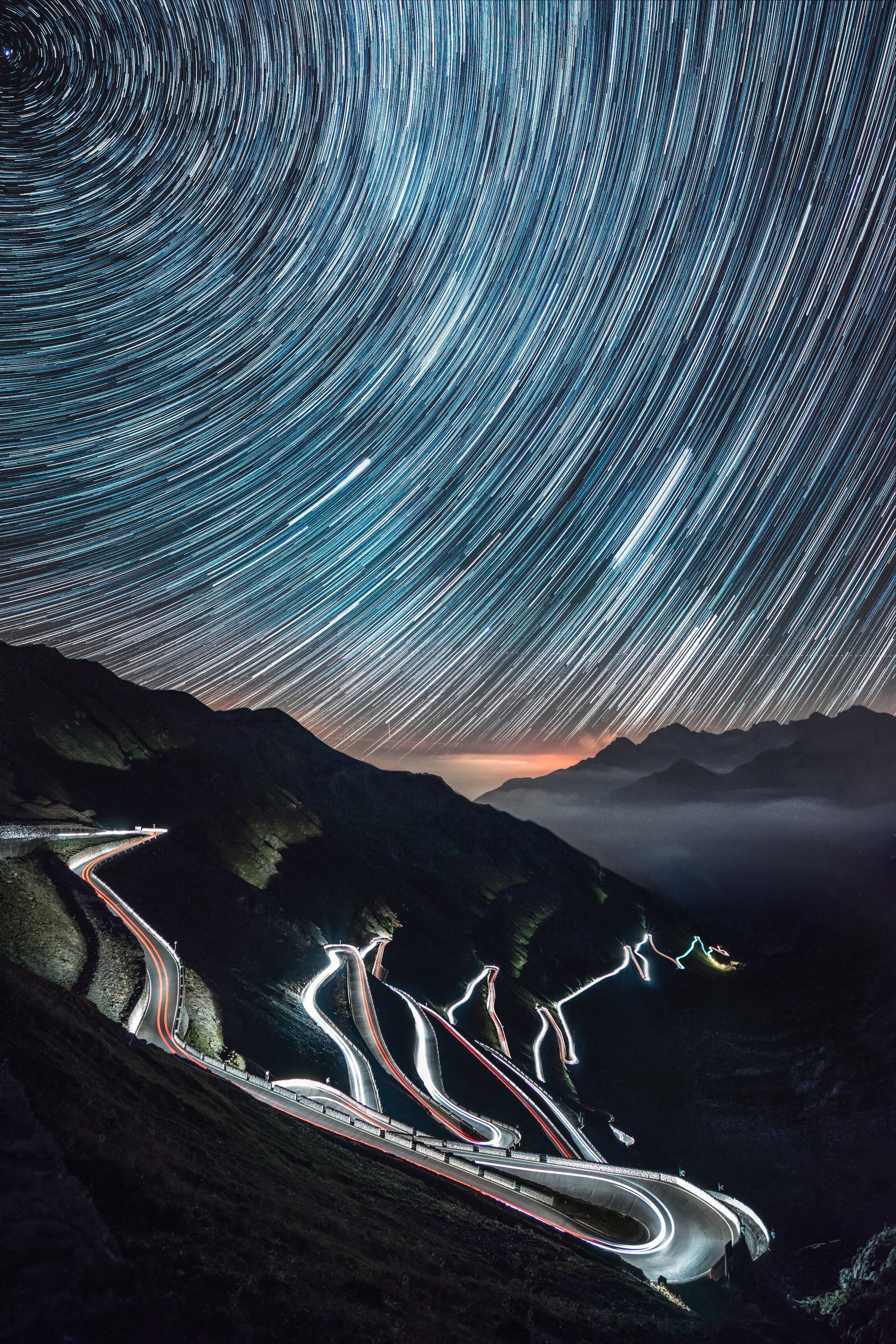 A Time Lapse Shot Of A Winding Highway, Starry Sky, And Mountains, Making A Brightly Lit Effec. Star Trails Photography, How To Photograph Stars, Galaxy Wallpaper