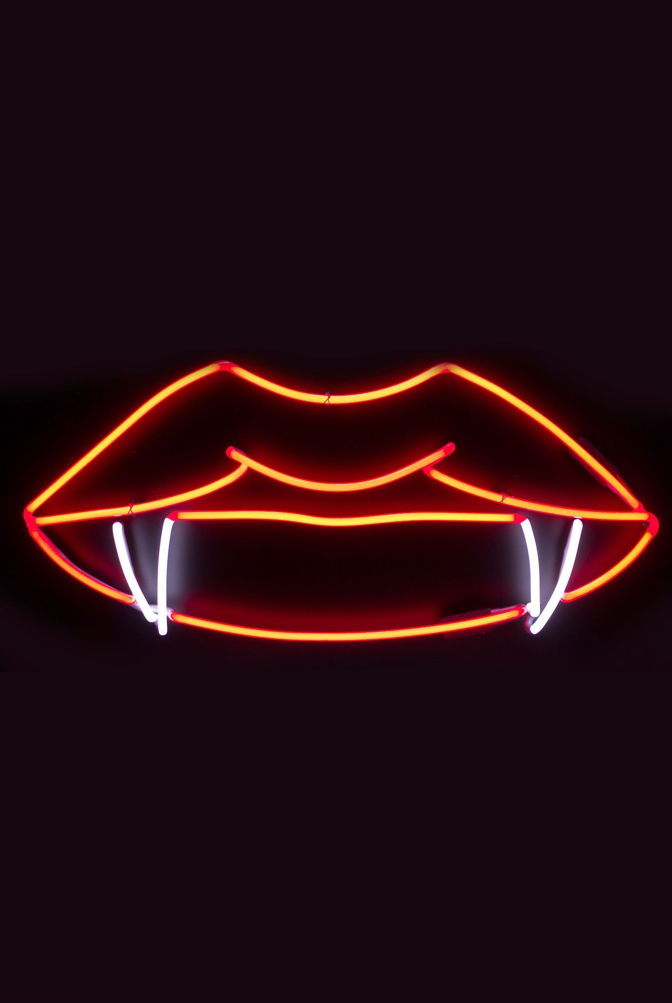 Lips and Fangs Neon Sign. Wallpaper iphone neon, Neon signs, Neon wall art