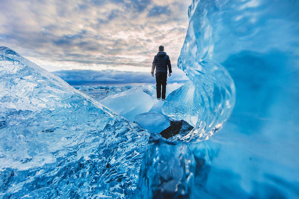 ice man floating on water photo edit wallpaper Image