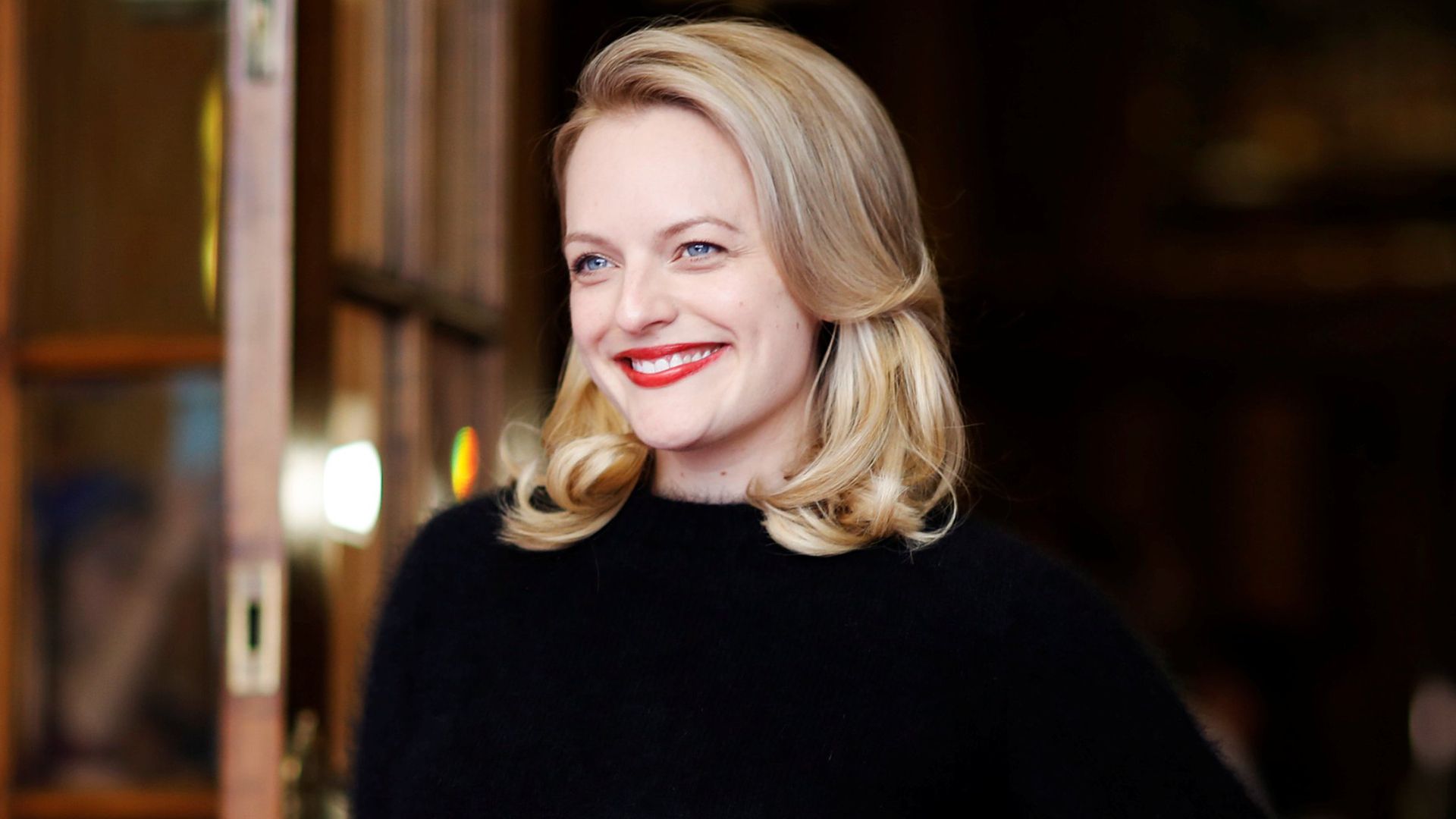 Elisabeth Moss debuts red hair for summer 2018